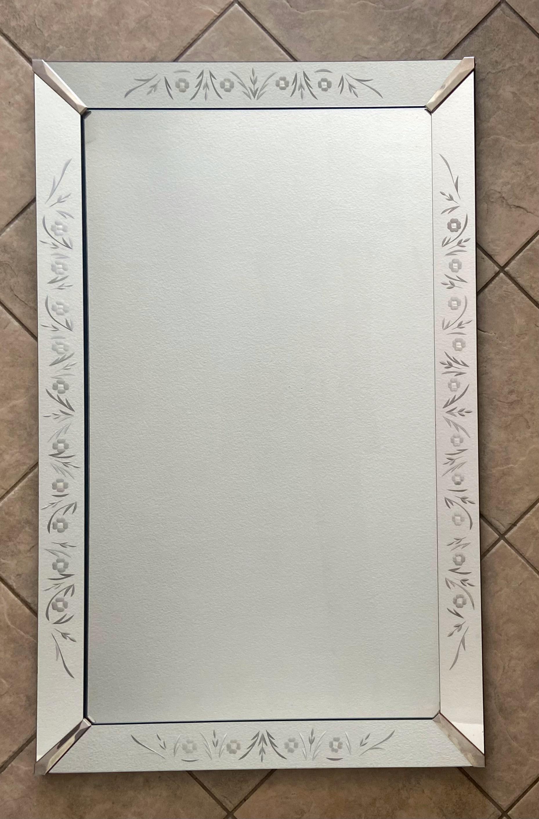 Rectangular Art Deco style wall mirror with nicely etched 