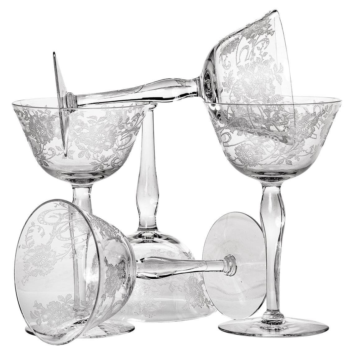 Late French Deco crystal stemware C1920-30's. Set of 5 in excellent condition. Fine blown glass featuring etched swirly pattern of flowers with leaves & branches. The glasses have a beautiful weight to them and are in excellent condition.