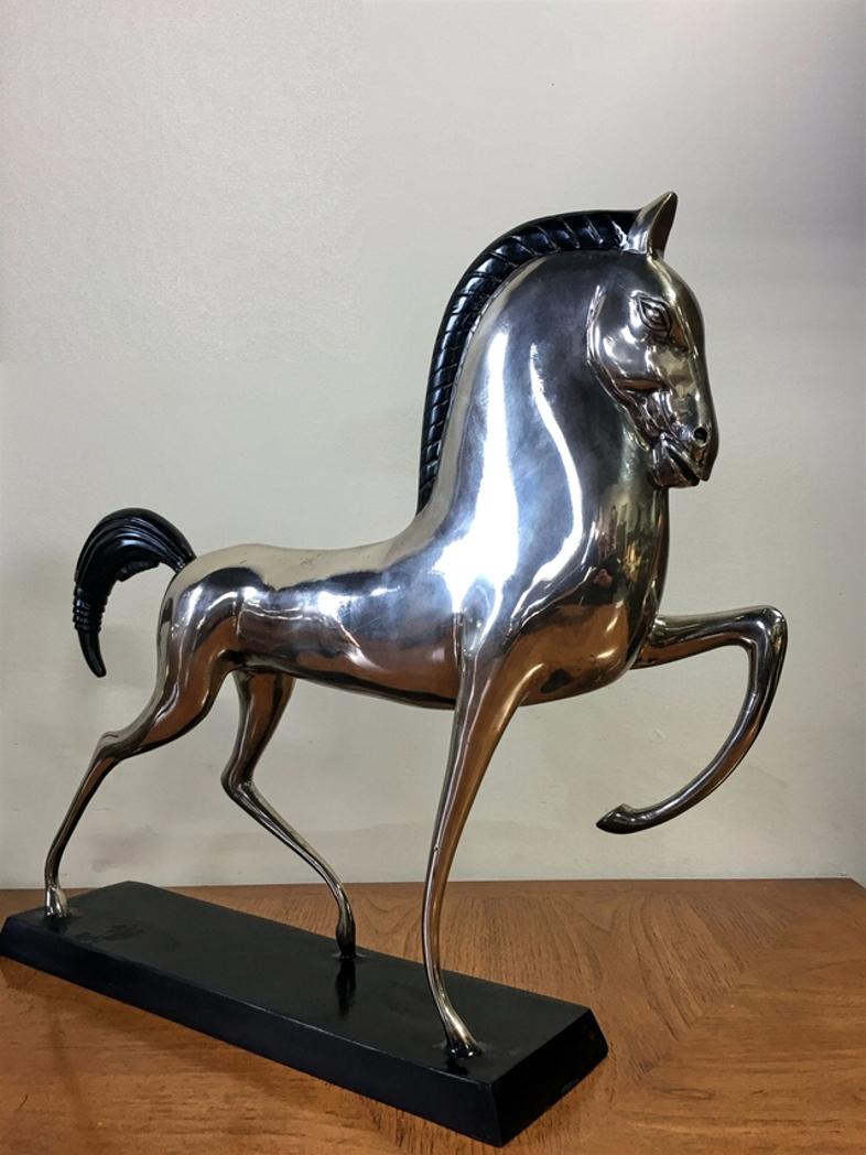 Wow! Here is an eye-popping pair of Art Deco style Etruscan Horse sculptures, unsigned, in the manner of Boris Lovet-Lorski. Made from mixed metals, primarily brass with a plating of either zinc or nickel. Each horse weighs approximately 15lbs. The