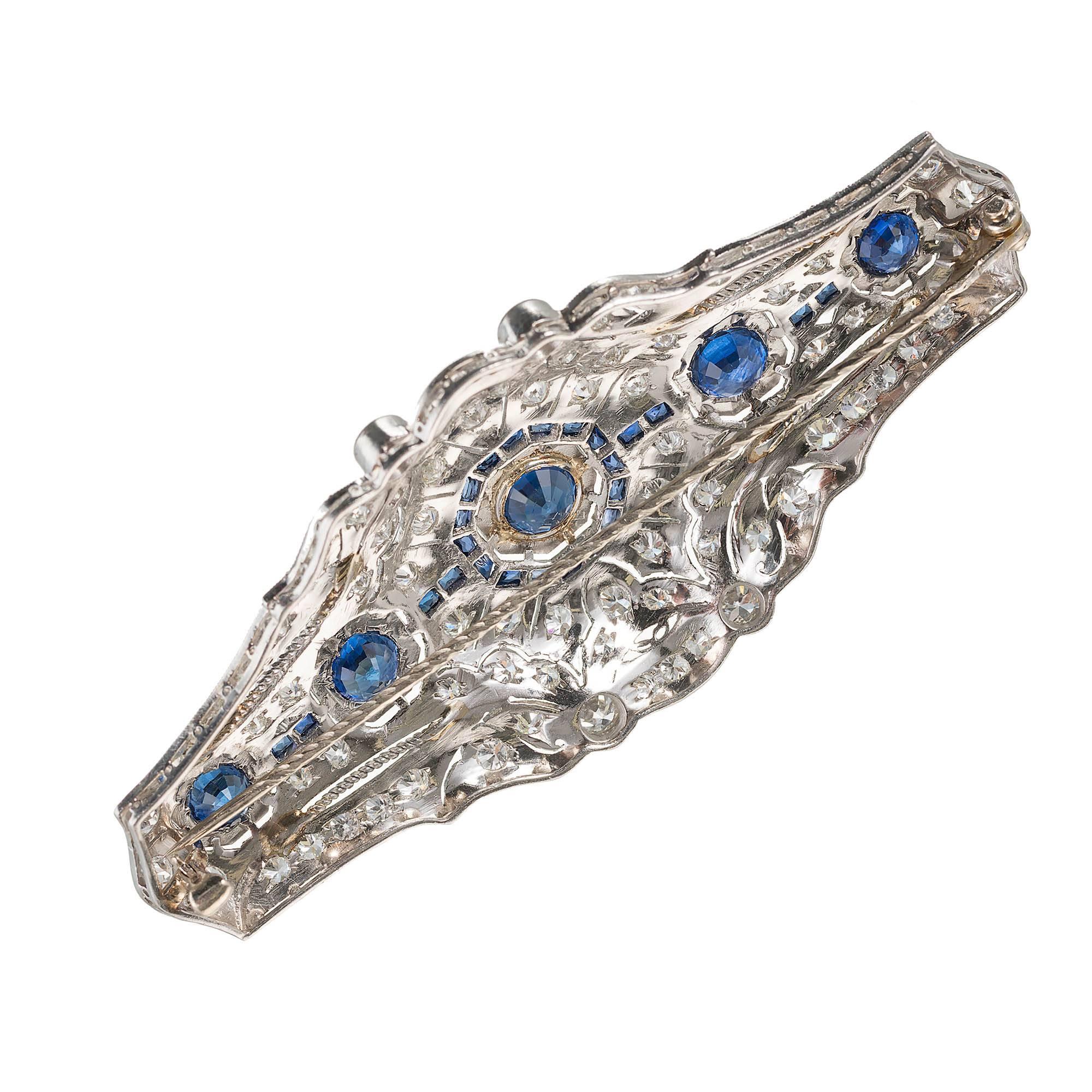 Art Deco brooch with five European cut blue sapphires with round diamonds and calibre cut sapphires.  Also set with 84 European cut accent diamonds. 

29 mixed shape Ceylon sapphires approx. total weight 5.00cts
84 round diamonds approx. total