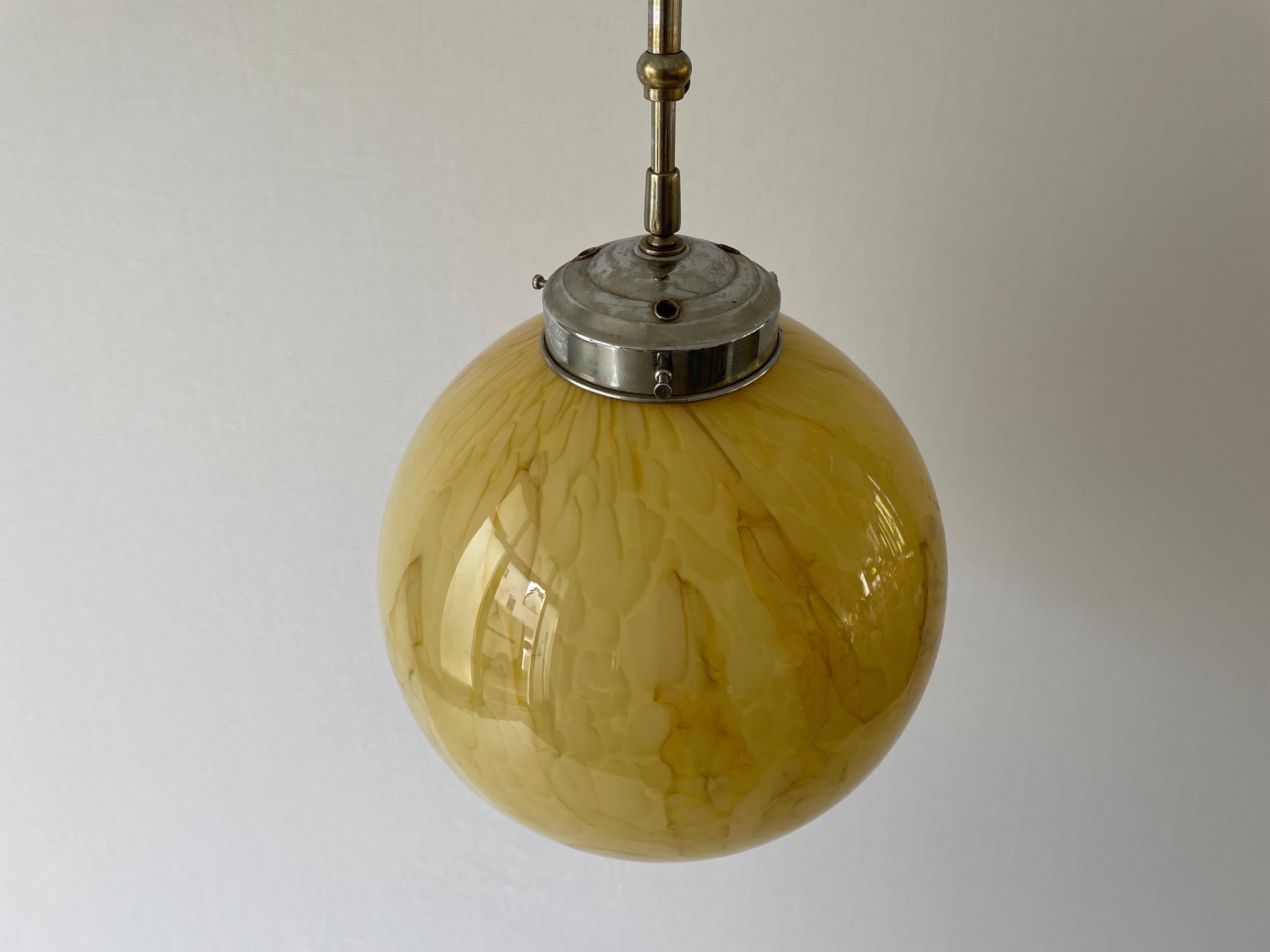 Art Deco Exceptional Church Lamp with Yellow Glass Ball , 1930s, Germany

This lamp works with E27 light bulb.

Movable shade - The shade can be moved with the help of the piece on the stick

Measurements: 
Height: 98 cm
Shade diameter: 28 cm


