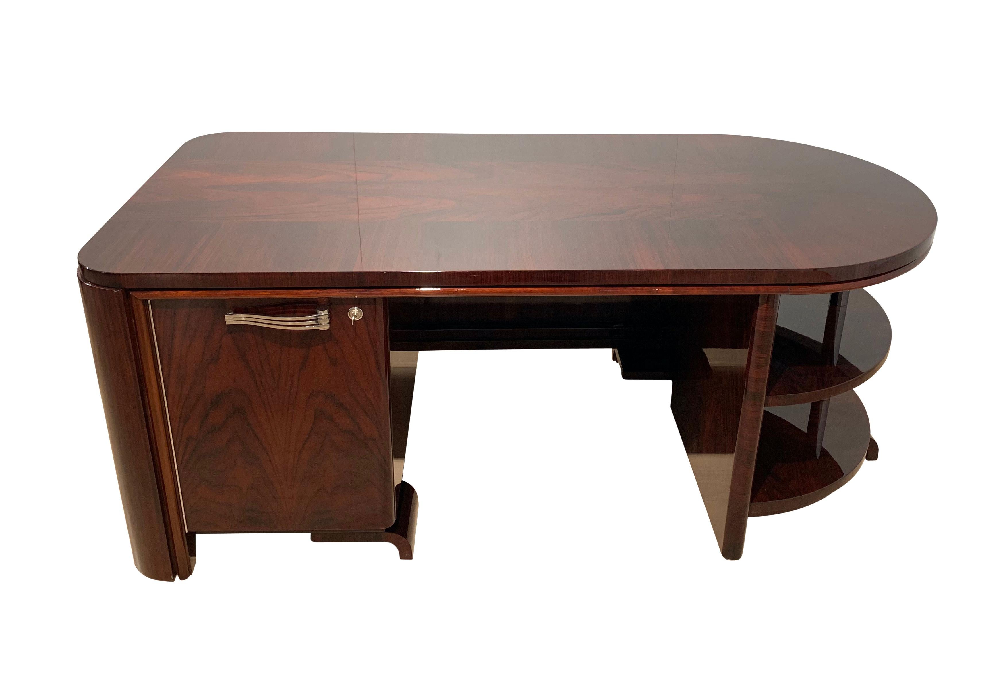 Original, restored french Art Deco Desk with leather swivel armchair from circa 1930s. 

Gorgeous Rosewood veneered and excellently lacquered with high-gloss clear piano lacquer. 
Beautiful veneer setting on the writing plate. Nickel-plated original