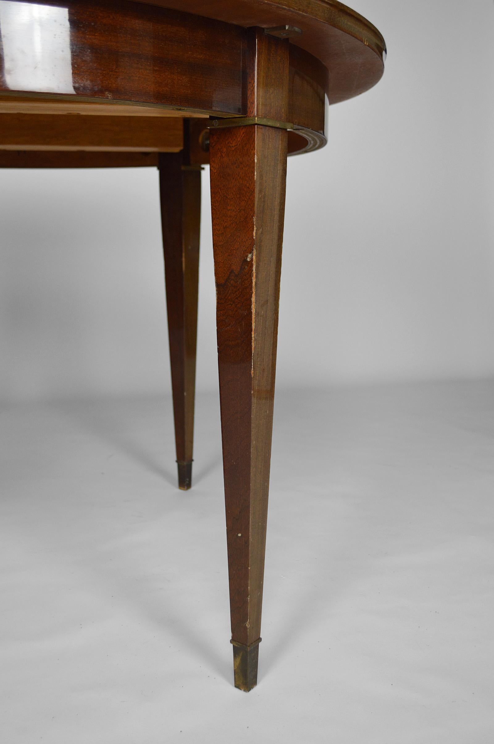 Table ronde à rallonge Art Déco en acajou, par Jacques Adnet, vers 1940 en vente 1