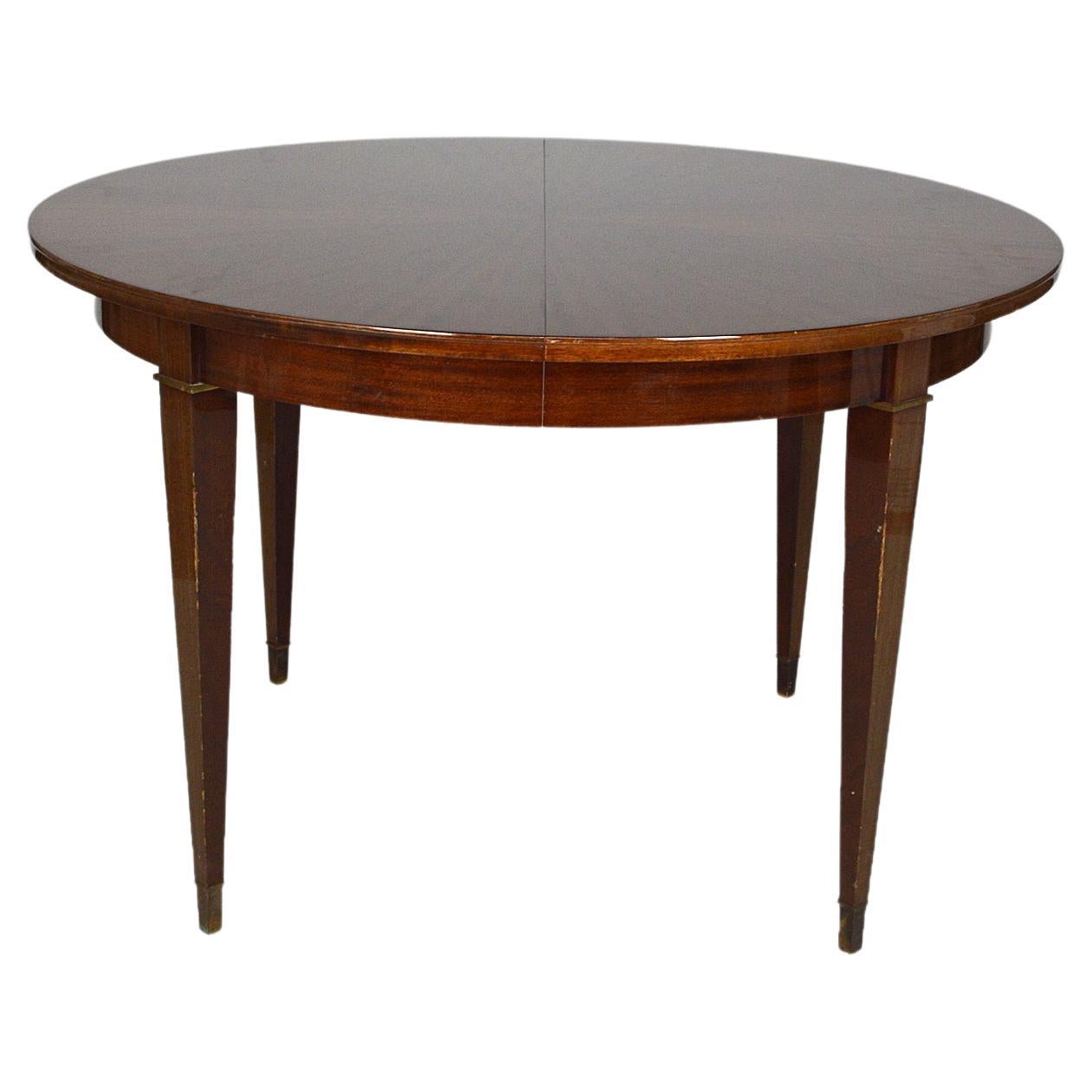 Art Deco Extendable Round Table in Mahogany, by Jacques Adnet, circa 1940 For Sale