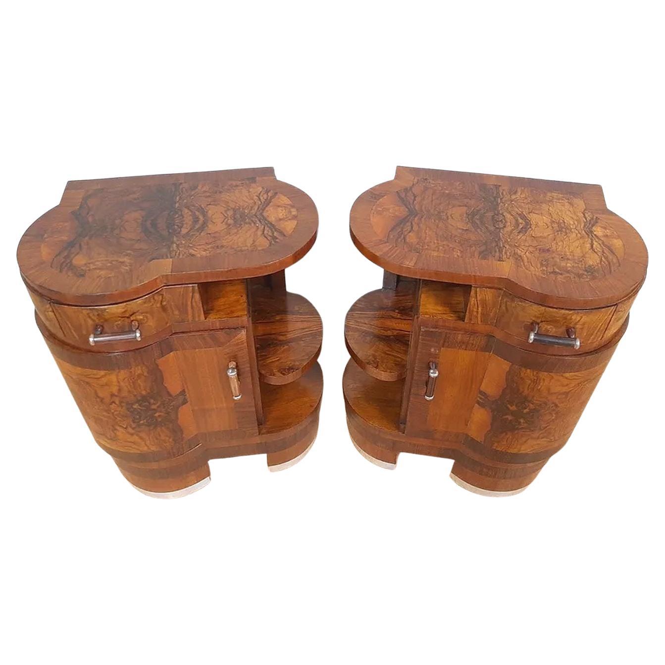A rare opportunity to acquire such high styled and totally original Art Deco bedside tables. Originating from Italy and dating to the early 1930s they fill both the highly desired shape of Art Deco at its best and sort after the luscious veneers