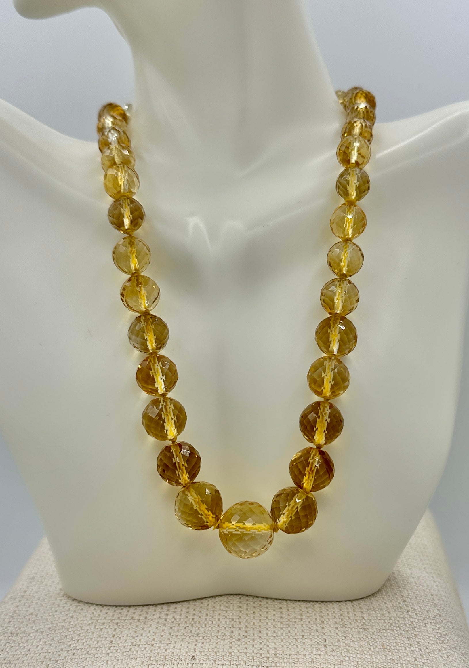 We are so delighted to have this gorgeous Art Deco - Victorian Citrine Necklace in 10 Karat Yellow Gold.  The wonderful necklace has the most stunning natural faceted Citrine beads which are graduated from 7mm to 15mm.  The Citrine gems have