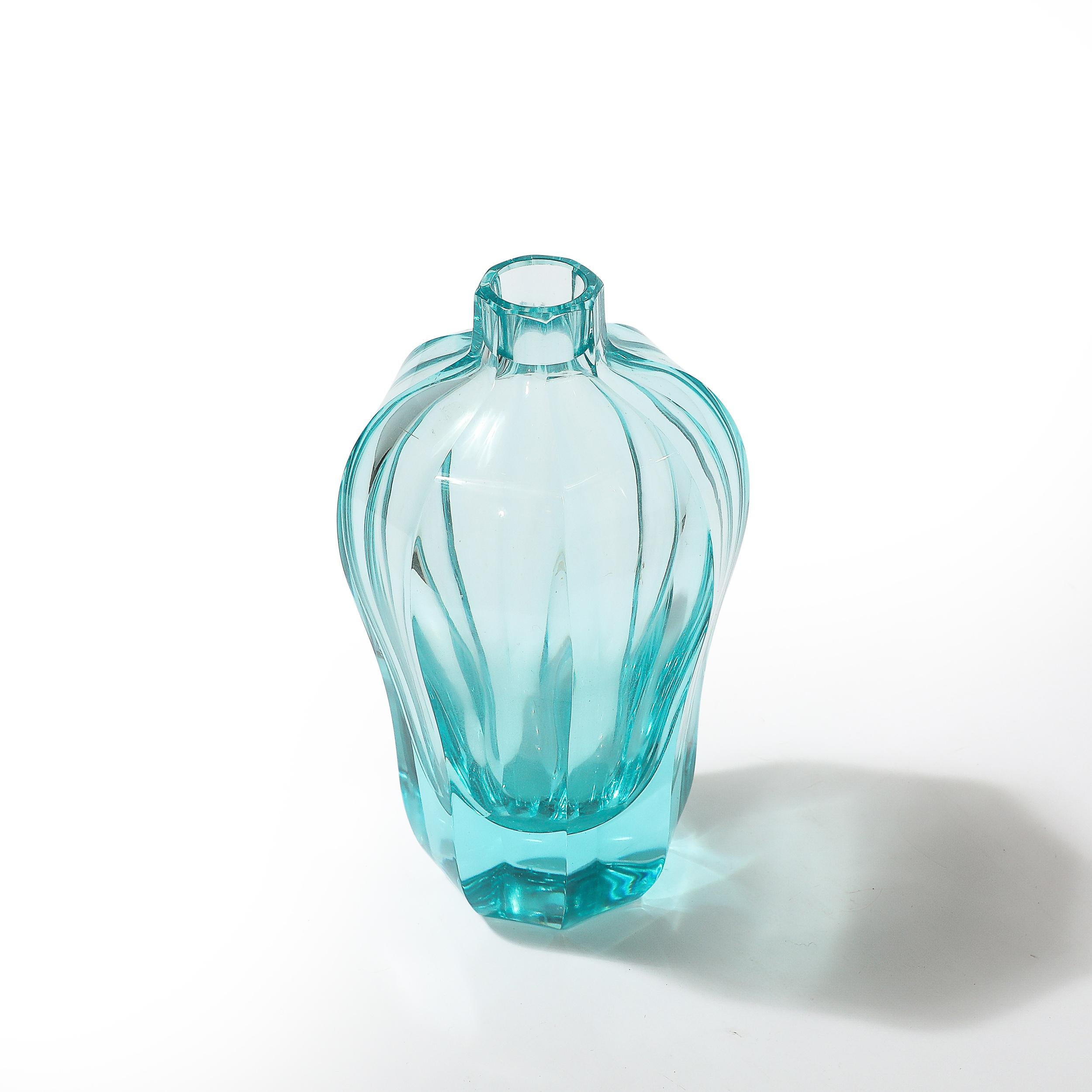This exquisite Art Deco vase, crafted in cut crystal and rendered in a captivating aquamarine hue, exemplifies the sophistication and innovation synonymous with the Moser glassworks of Czechoslovakia. Signed by Moser and dating to circa 1930, this