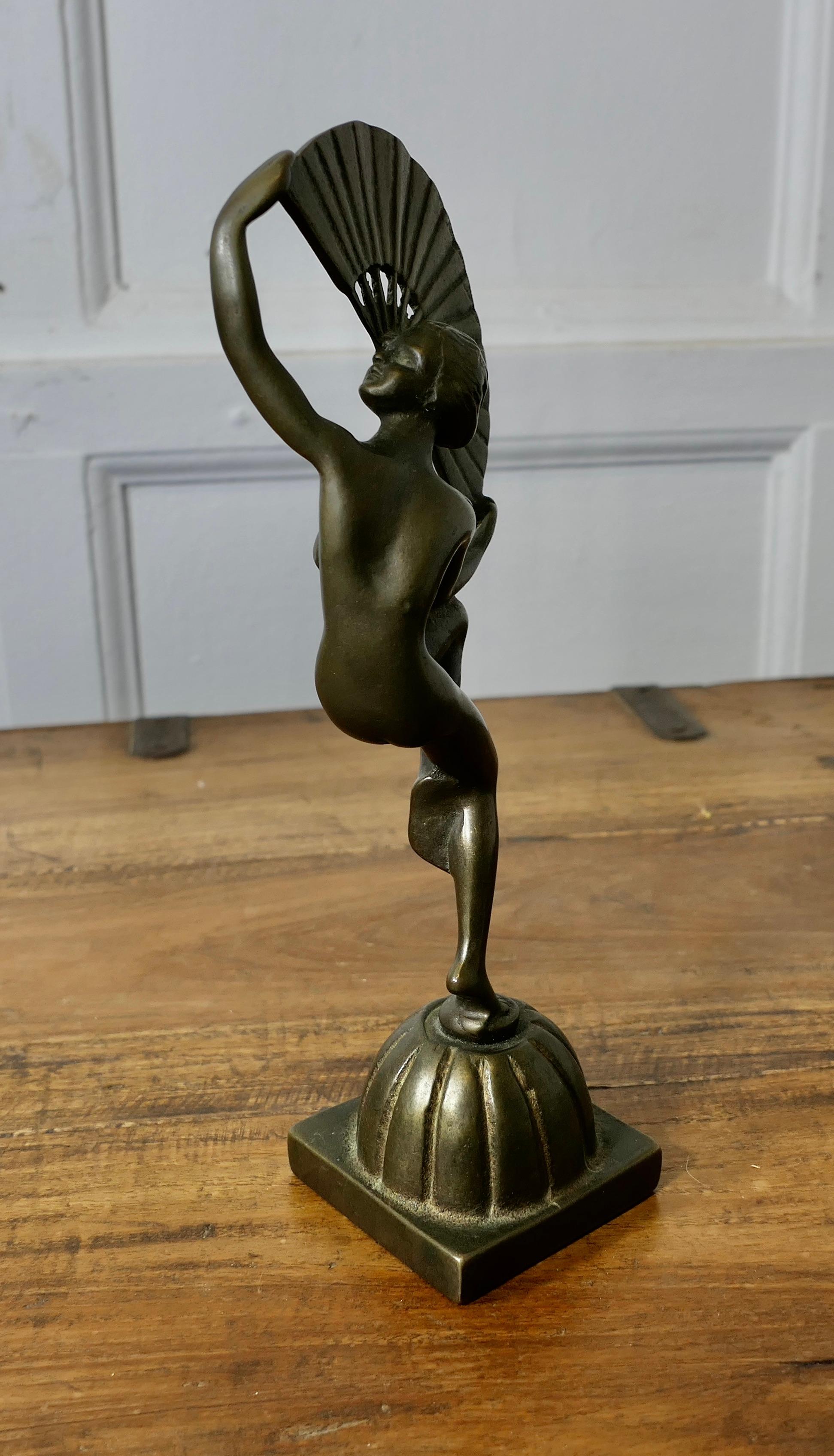 Art Deco Fan Dancer, Brass Statue  

A fabulous model from the 1930s cast in brass and in good condition, a wonderful studio desk ornament

Our Lovely lady is 10” high and about 4” in diameter 
ZX78