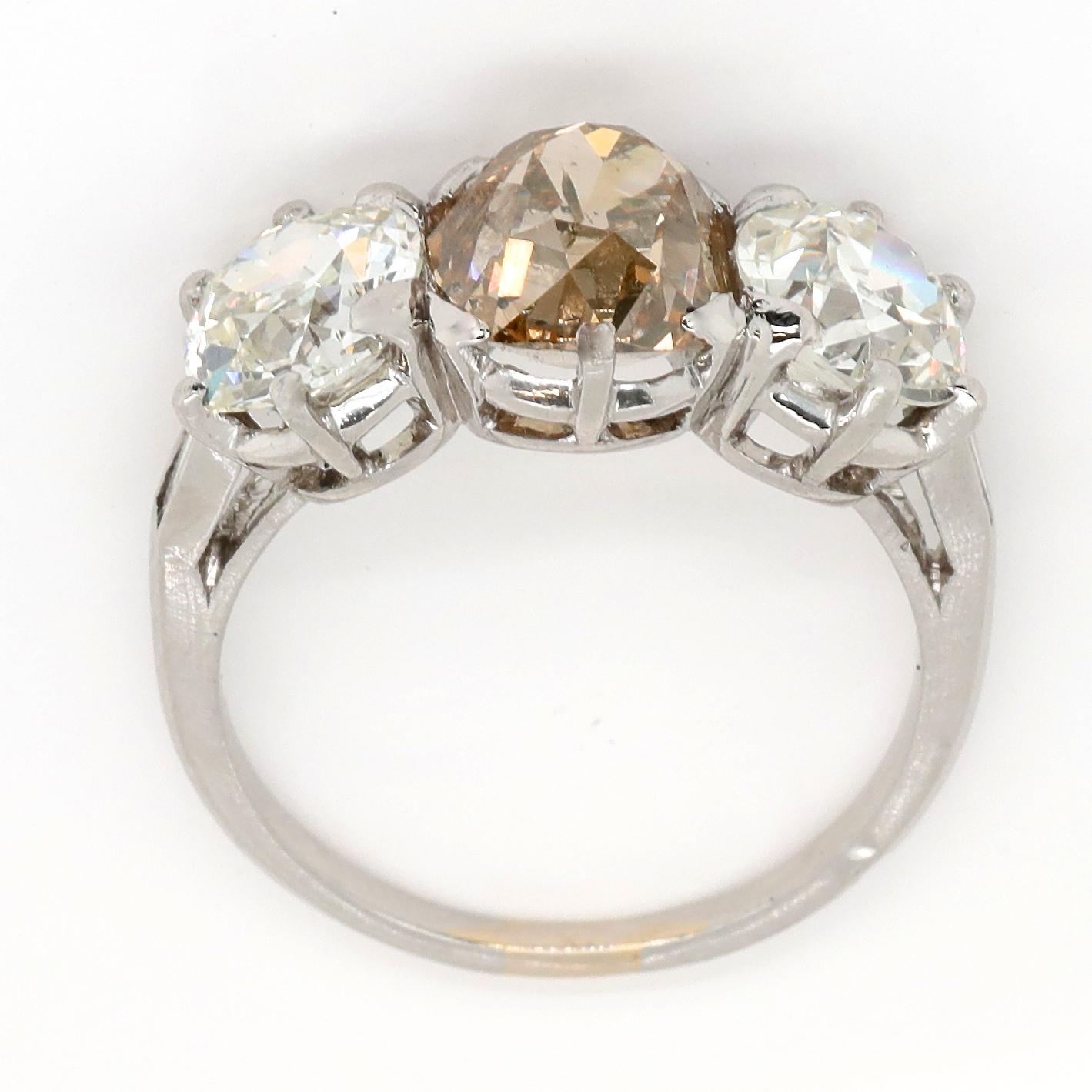 Women's Art Deco Fancy 6.04 Carats Old European Cut Diamond Three-Stone Platinum Ring