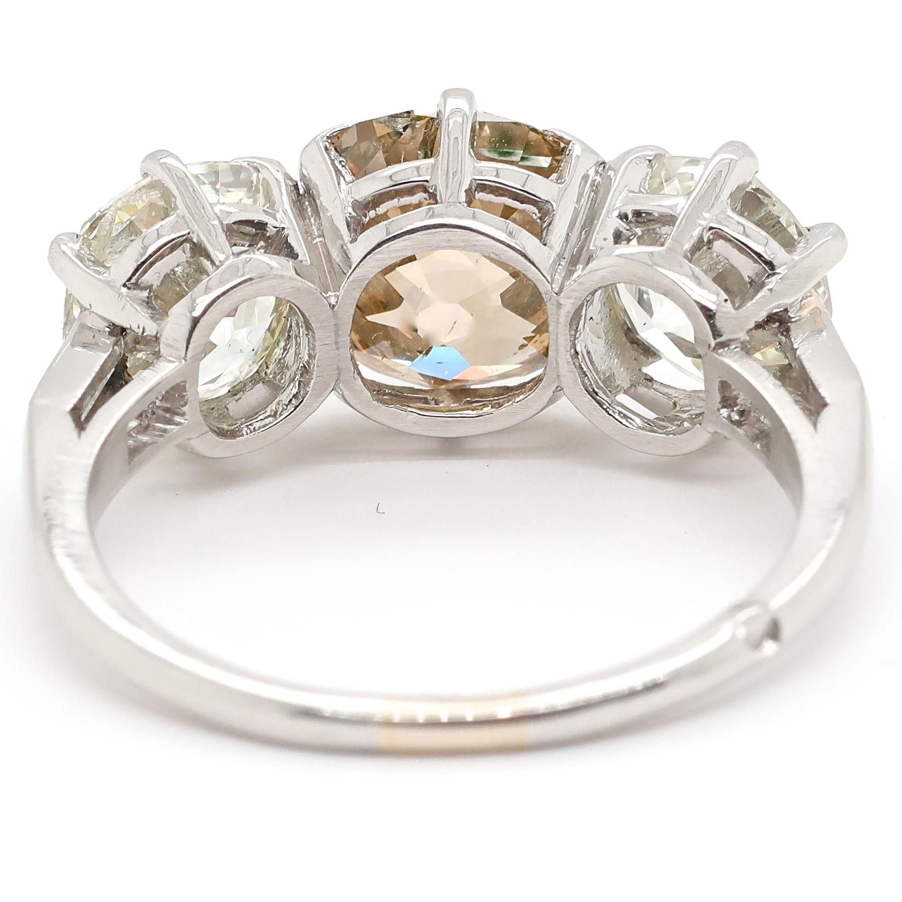Art Deco Fancy 6.04 Carats Old European Cut Diamond Three-Stone Platinum Ring 1