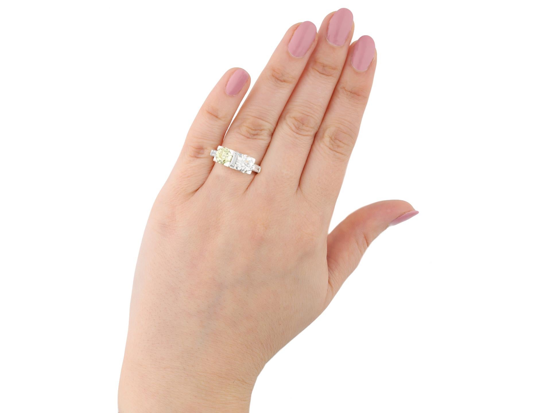 Art Deco Fancy Light Yellow Diamond Two Stone Ring by Gubelin, circa 1920 In Good Condition For Sale In London, GB