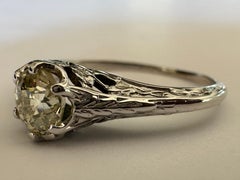 Art Deco Fancy Pale Yellow Diamond Solitaire and Filigree Ring
