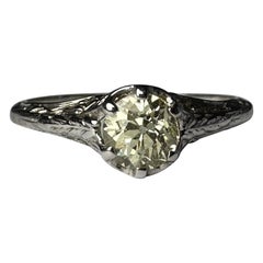 Art Deco Fancy Pale Yellow Diamond Solitaire and Filigree Ring