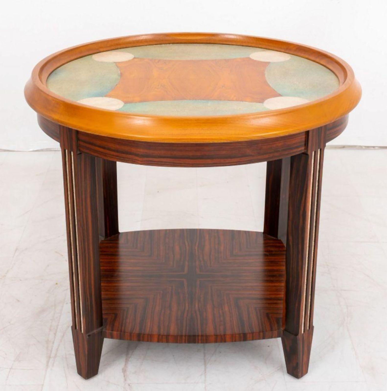 Vintage Art Deco side table made in a sophisticated design with Macassar ebony wood base, providing a rich, dark contrast. The tabletop is made with faux shagreen, and also boasts inlaid rosewood details. The piece also can be used as a game
