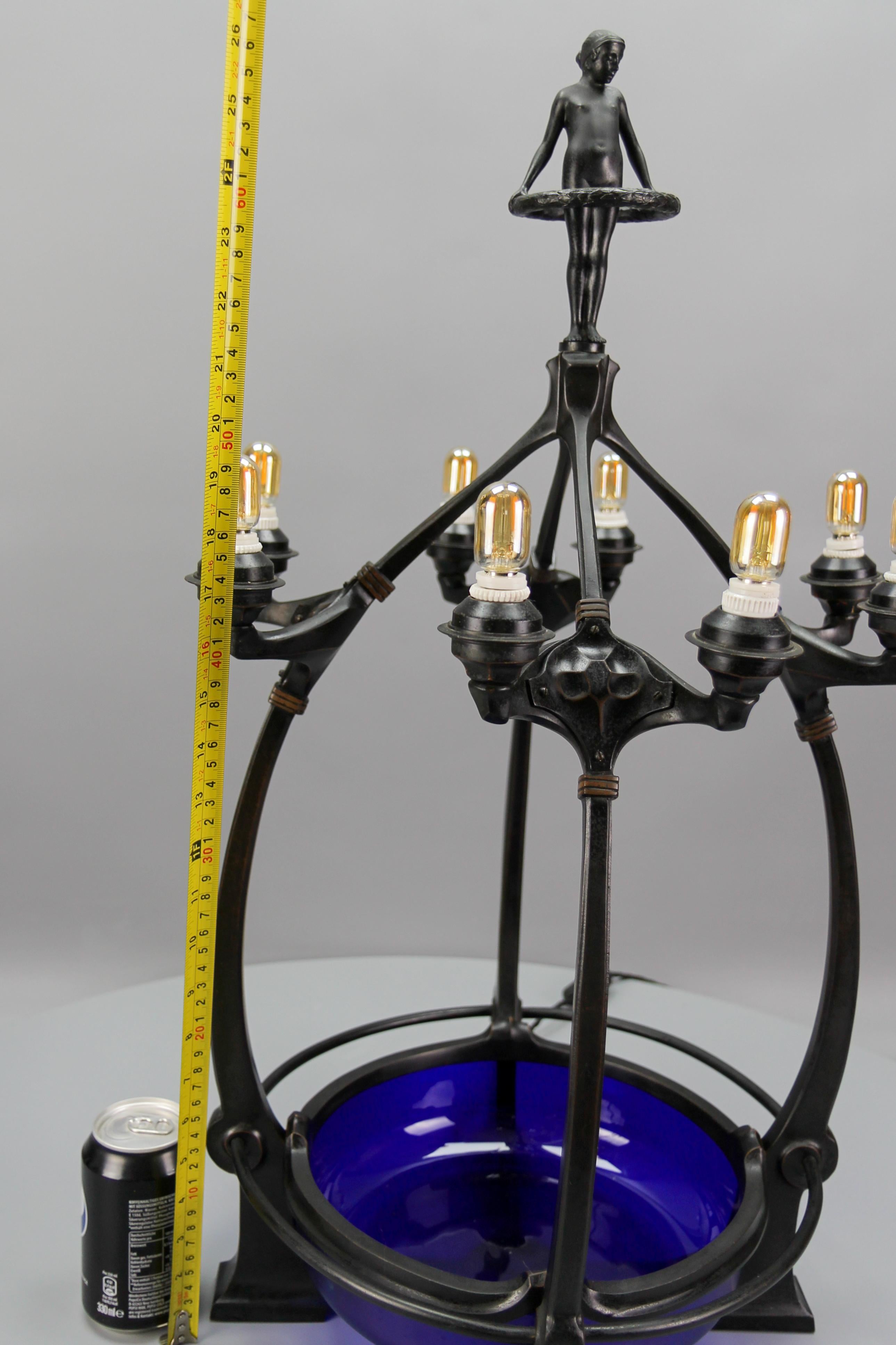 Art Deco Figural Eight-Light Table Lamp with Blue Iridescent Glass, 1930s For Sale 8