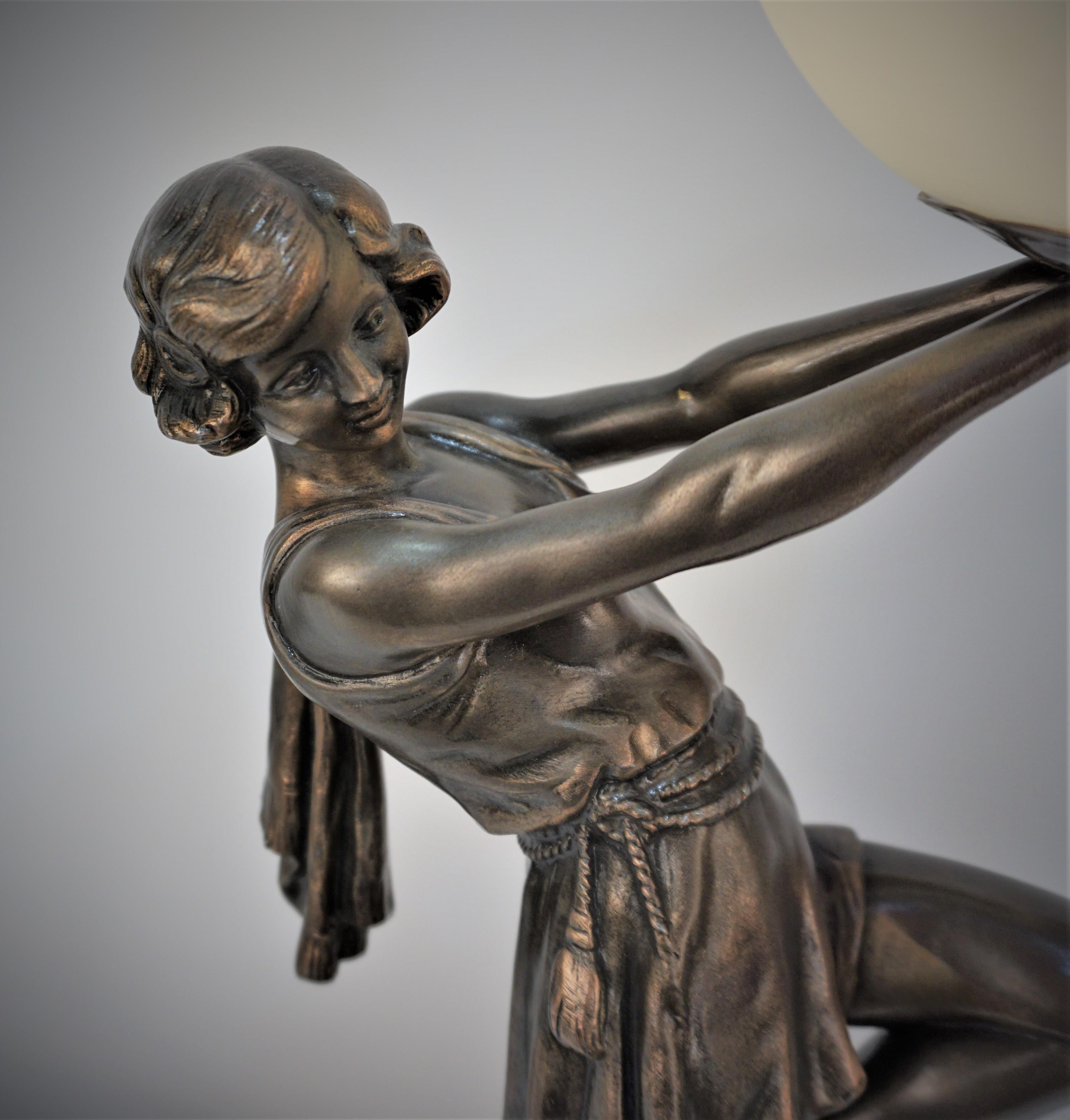  Art Deco figural Holding a Globe Table Lamp by Fabrication Francaise Paris 4