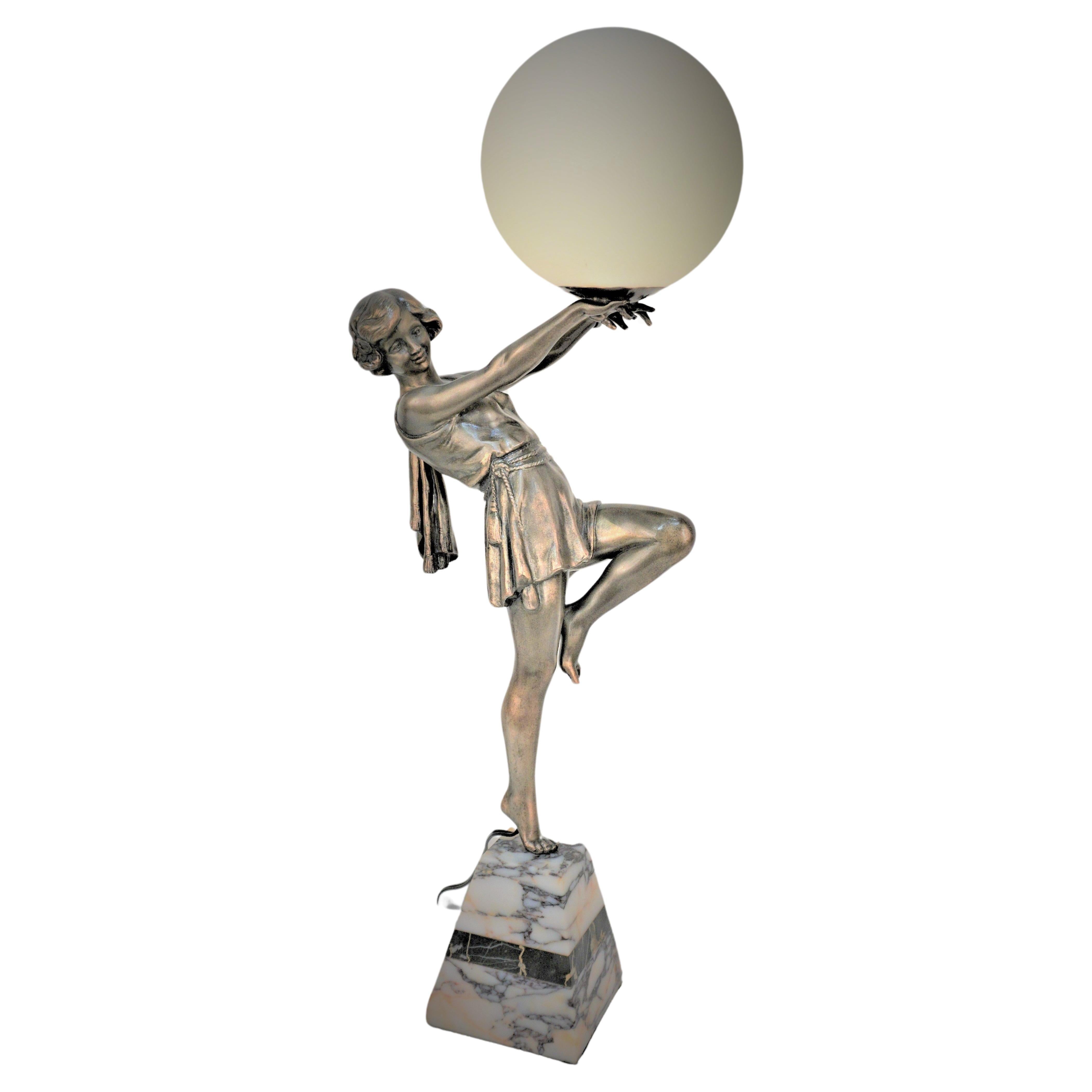  Art Deco figural Holding a Globe Table Lamp by Fabrication Francaise Paris
