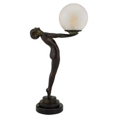 Art Deco style Lamp Standing Nude Holding a Glass Shade Max Le Verrier Clarté