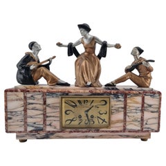 Reloj de sobremesa figurativo de estilo Art Déco «Pierrot y Columbine», de Sega