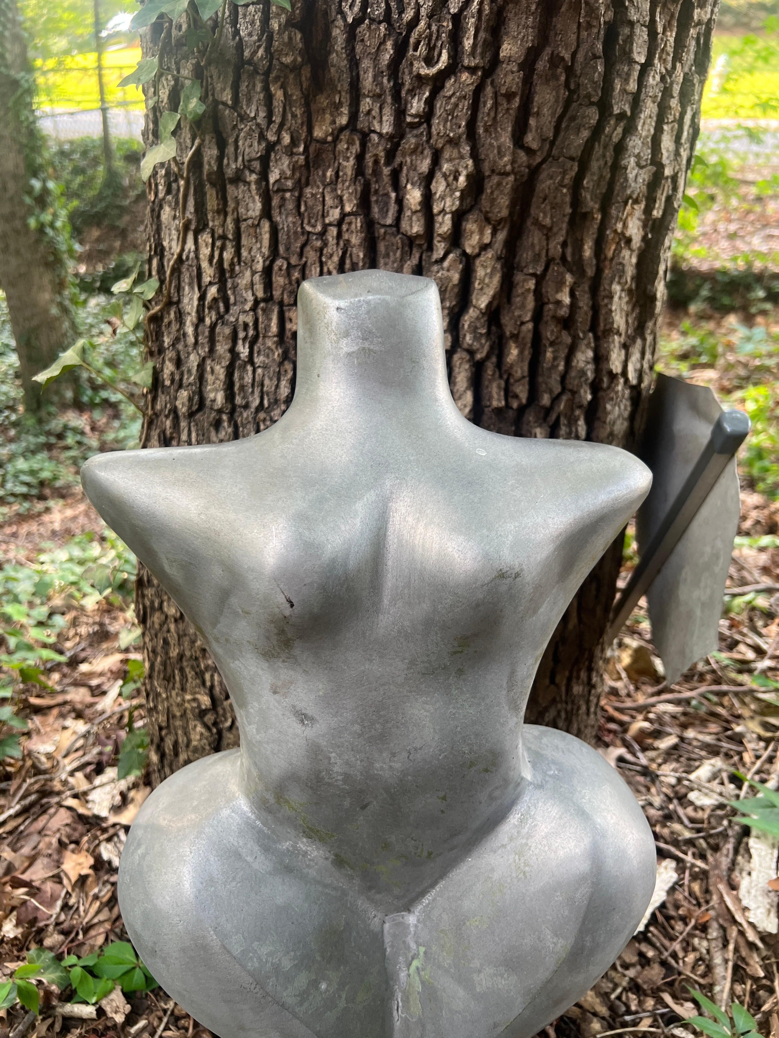 Possibly French, early 20th century. 

A very unique aluminum sculpture depicting a nude female torso, possibly a Venus representation. 
This piece came out of a New England garden where it sat for what the estate claims to be over 30 years.