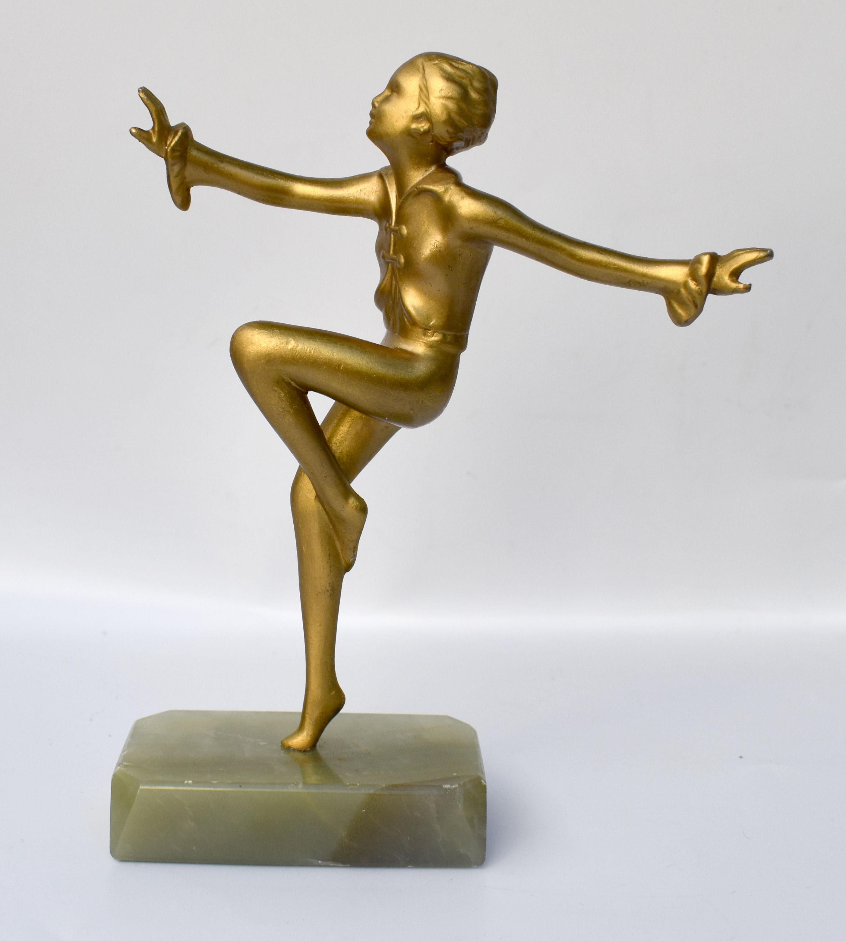 For your consideration is this wonderful 1930's Art Deco female dancer figure made from Spelter and gilded on top. She rests on an green onyx base and stands 17 cm tall so a good height for display. Beautifully detailed and good vintage condition,