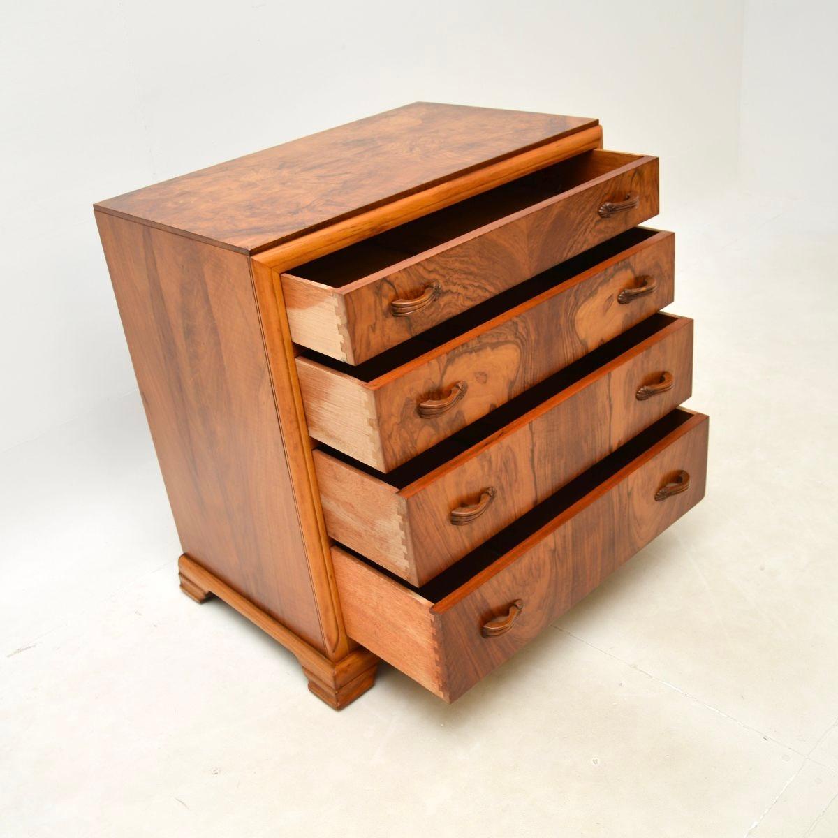 A stunning original Art Deco figured walnut chest of drawers. This was made in England, it dates from the 1930’s.

The quality is outstanding and this is a very useful size. It has lots of storage space inside the four drawers, with lovely looped