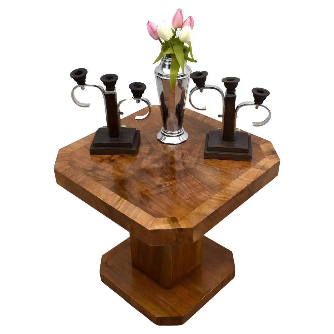 Fabulous and totally original 1930's Art Deco walnut occasional table originating from England, UK. This table is ideal for modern day use either as a coffee table or center table. The veneers are an absolute delight with figuring on every angle,