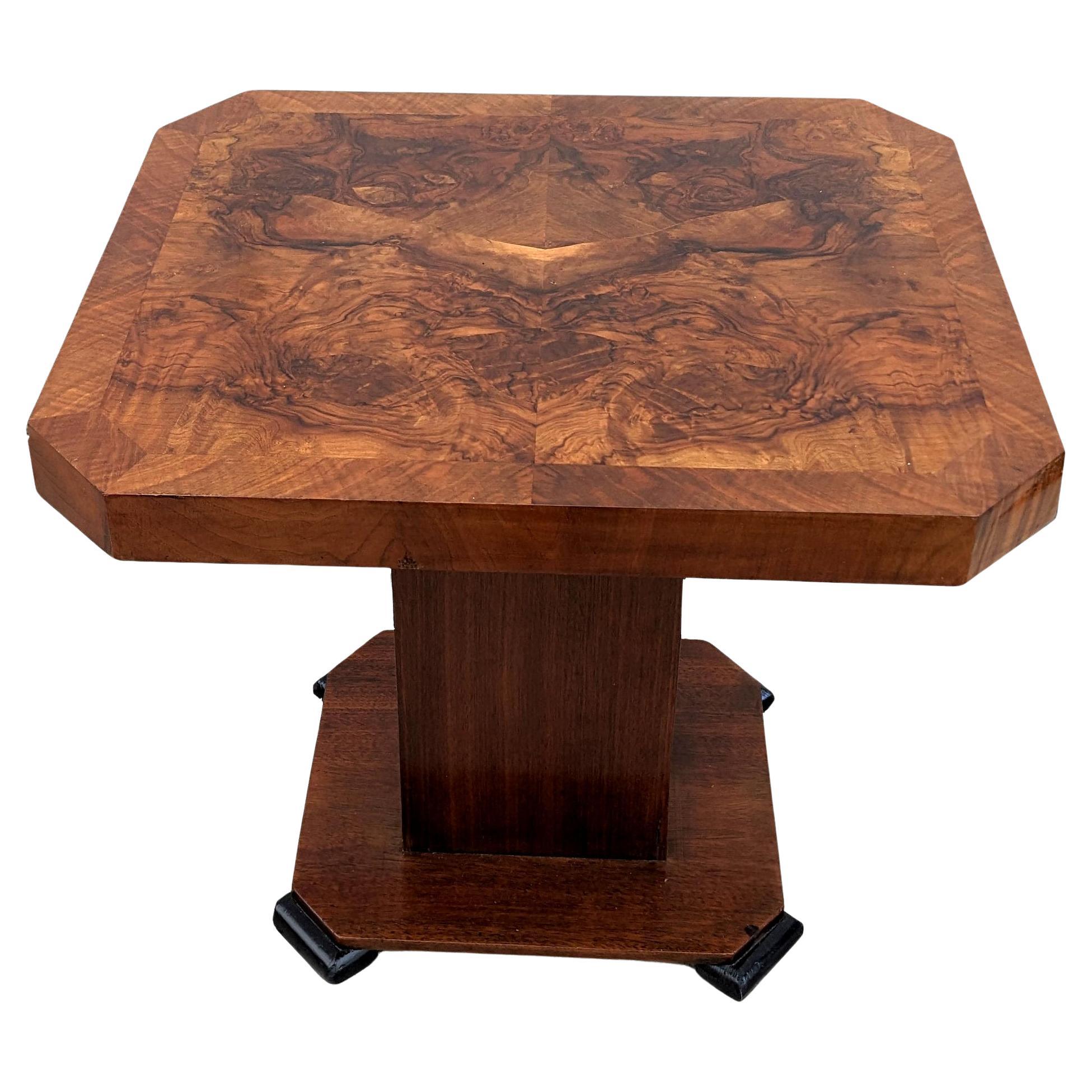 Fabulous and original 1930's Art Deco walnut occasional table. This table is ideal for modern day use either as a coffee table or centre table. The veneers are an absolute delight with figuring on every angle, the top boasts highly figured and very
