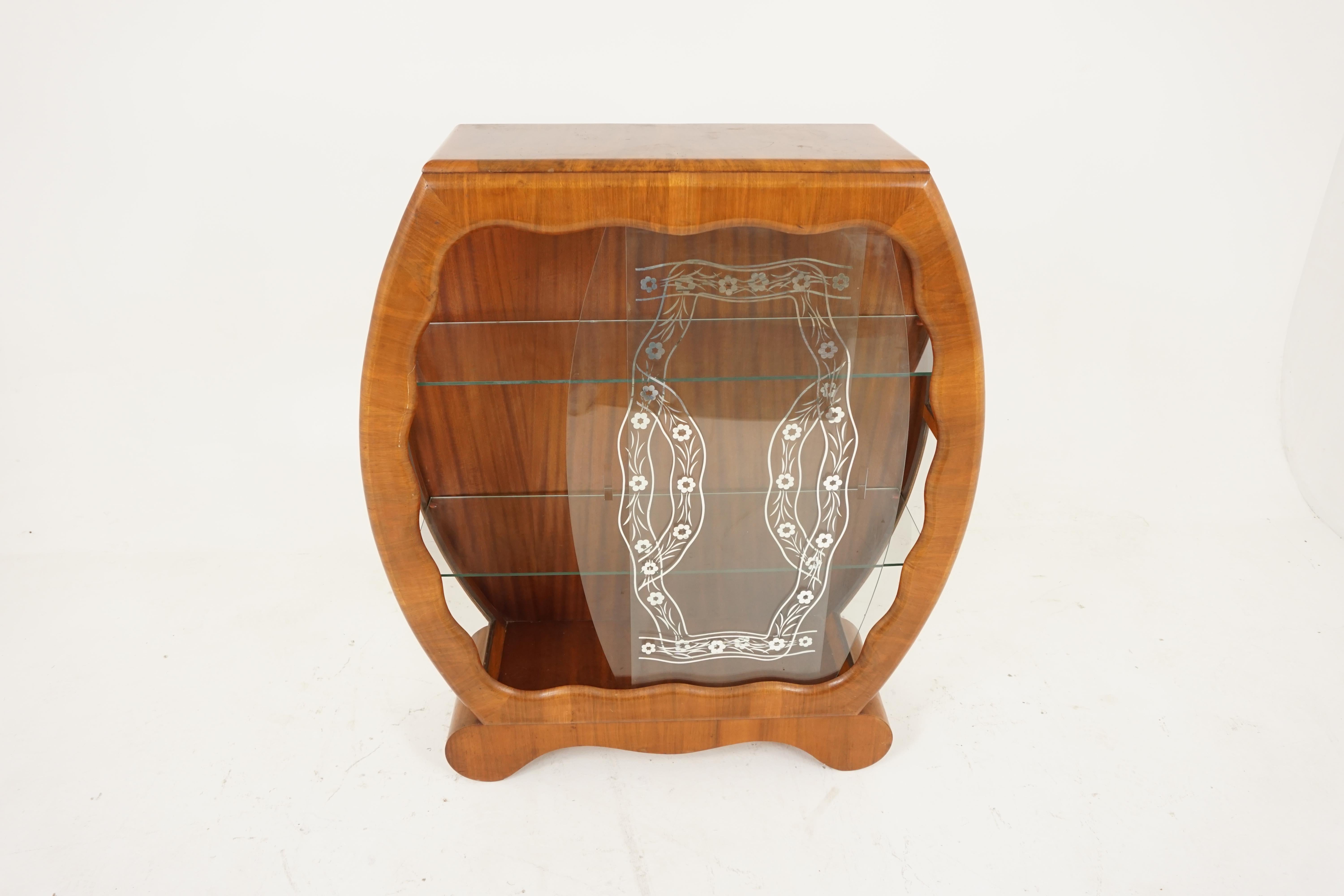 Art Deco figured walnut display, drinks, china cabinet, Scotland, 1930, B2069

Scotland 1930
Solid walnut and veneer 
Original finish
Moulded rectangular top
Rounded ends
Pair of sliding glass doors
Original silvered decoration on the