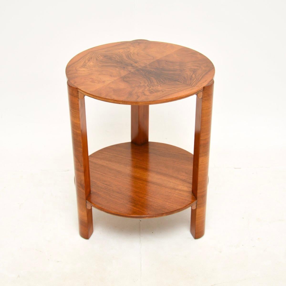 A stylish and well made Art Deco figured walnut occasional side table. This was made in England, it dates from the 1920-30’s.

It is of lovely quality and is a very useful size for use in various settings around the home. The circular top and lower