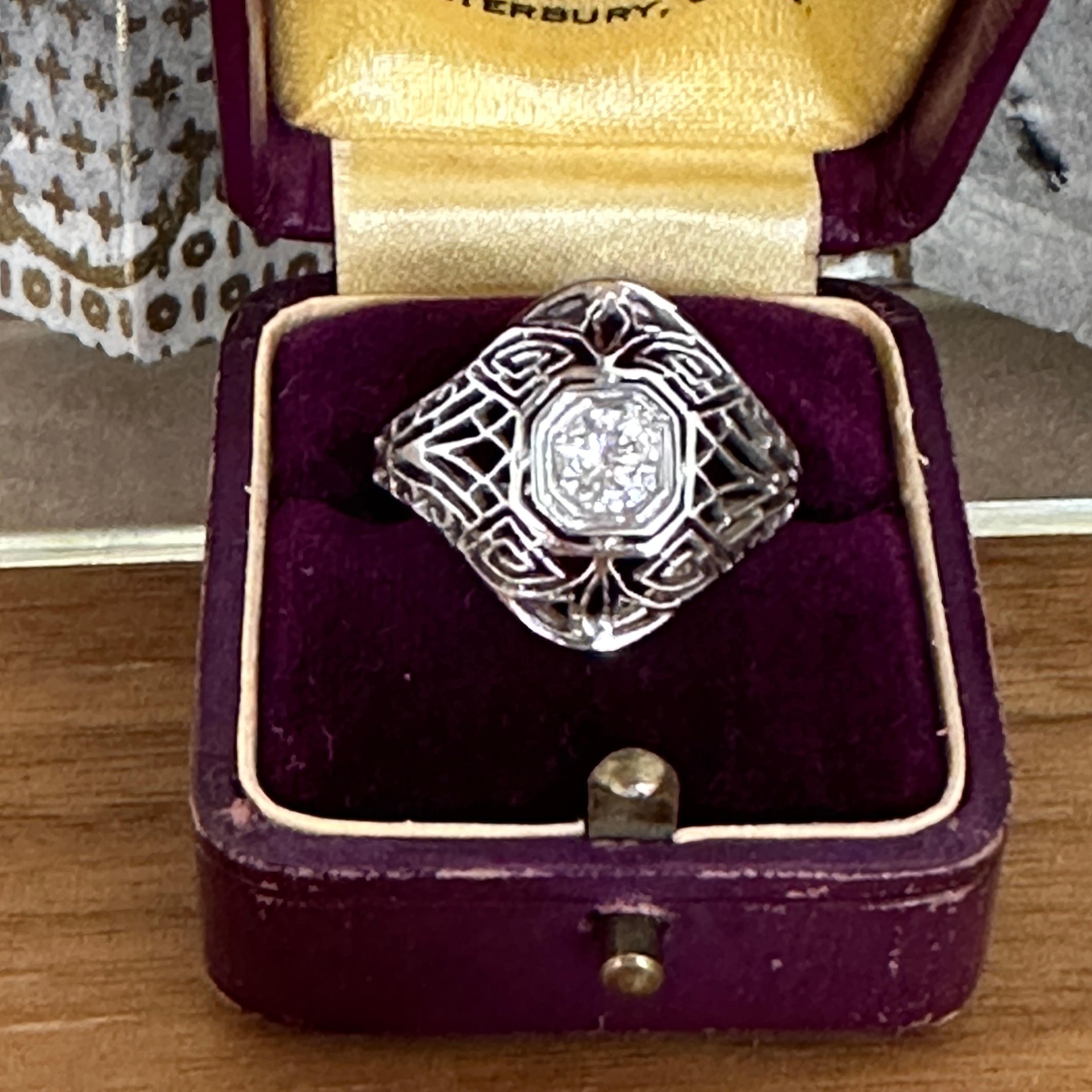 Details:
Fabulous Art Deco diamond filligree ring set in 14K white gold. A bold ring, with lots of character. Single diamond measuring 4.2mm. This is a sweet ring—you will not be disappointed! Please ask all necessary questions prior to placing an