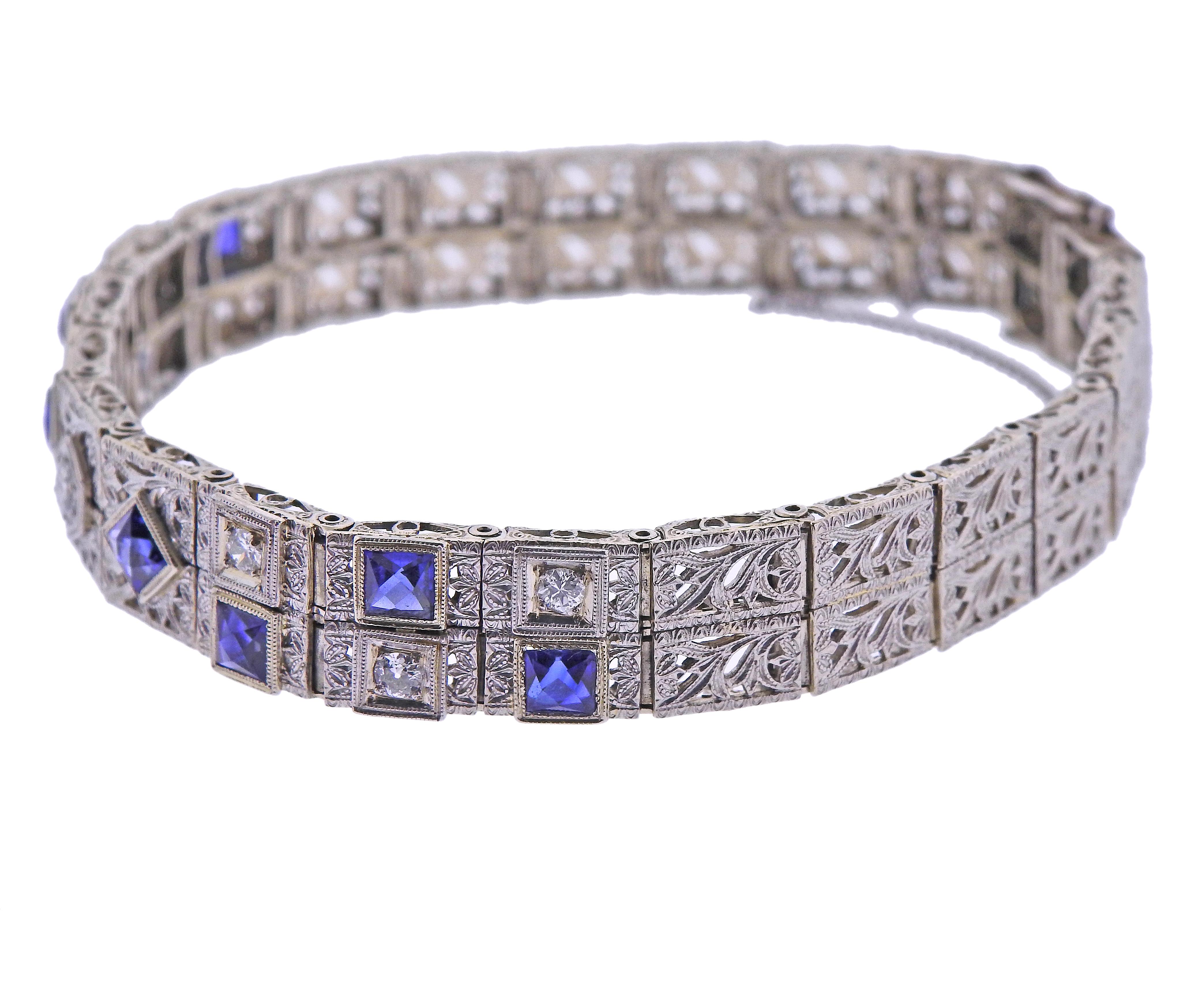 Art Deco Filigree 14k gold bracelet, with synthetic blue sapphires and 0.40ctw in diamonds. Bracelet is 7