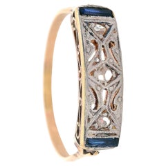 Art Deco filigree Ring in 18kt Gold and Platinum with Diamonds and Sapphires