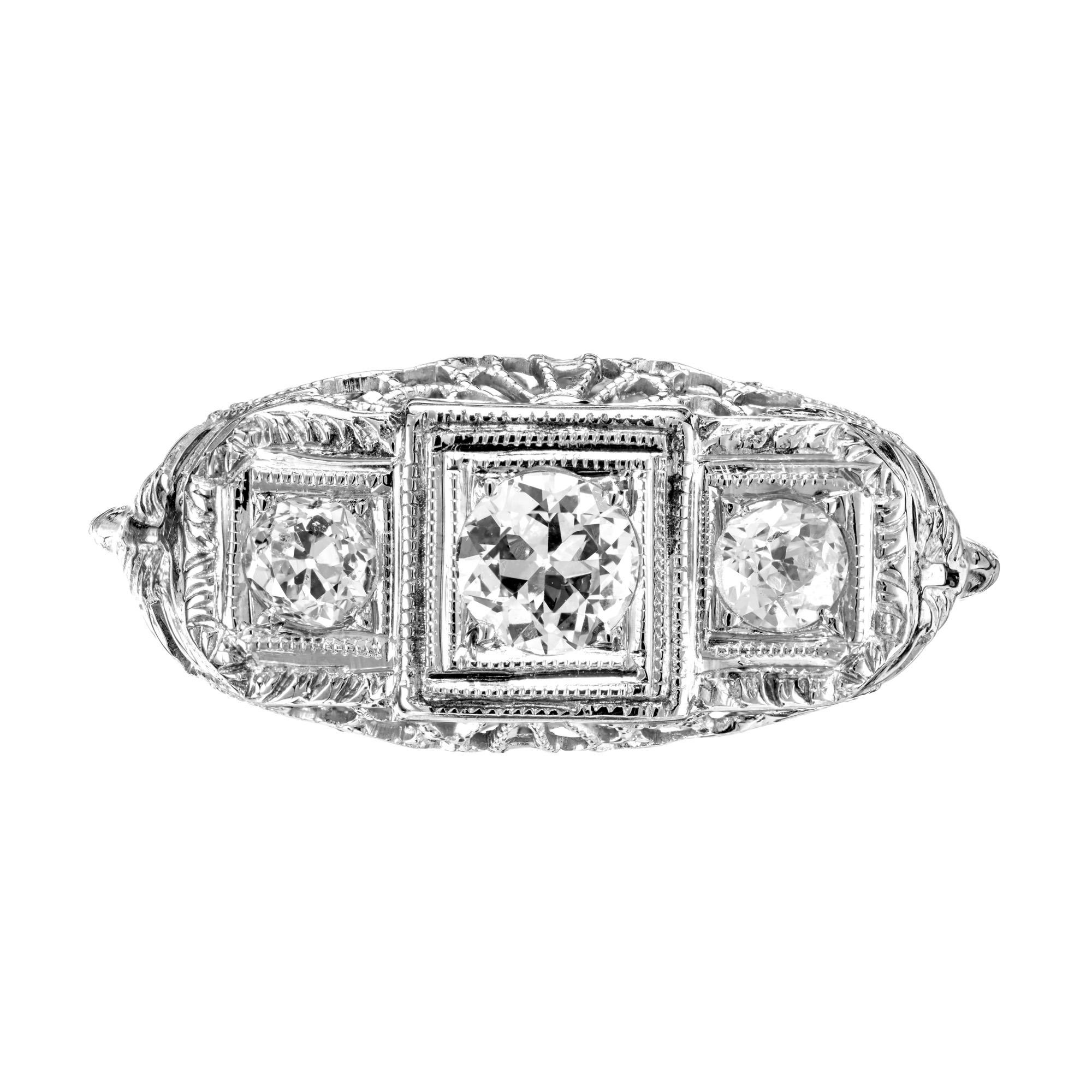 1930's raised top filigree Art Deco diamond engagement ring. 3 European transitional cut diamonds set in an 18k white gold filigree setting. 

3 European transitional cut diamonds, approx. total weight .48cts, G, VS
Size 6.25 and sizable
18k white