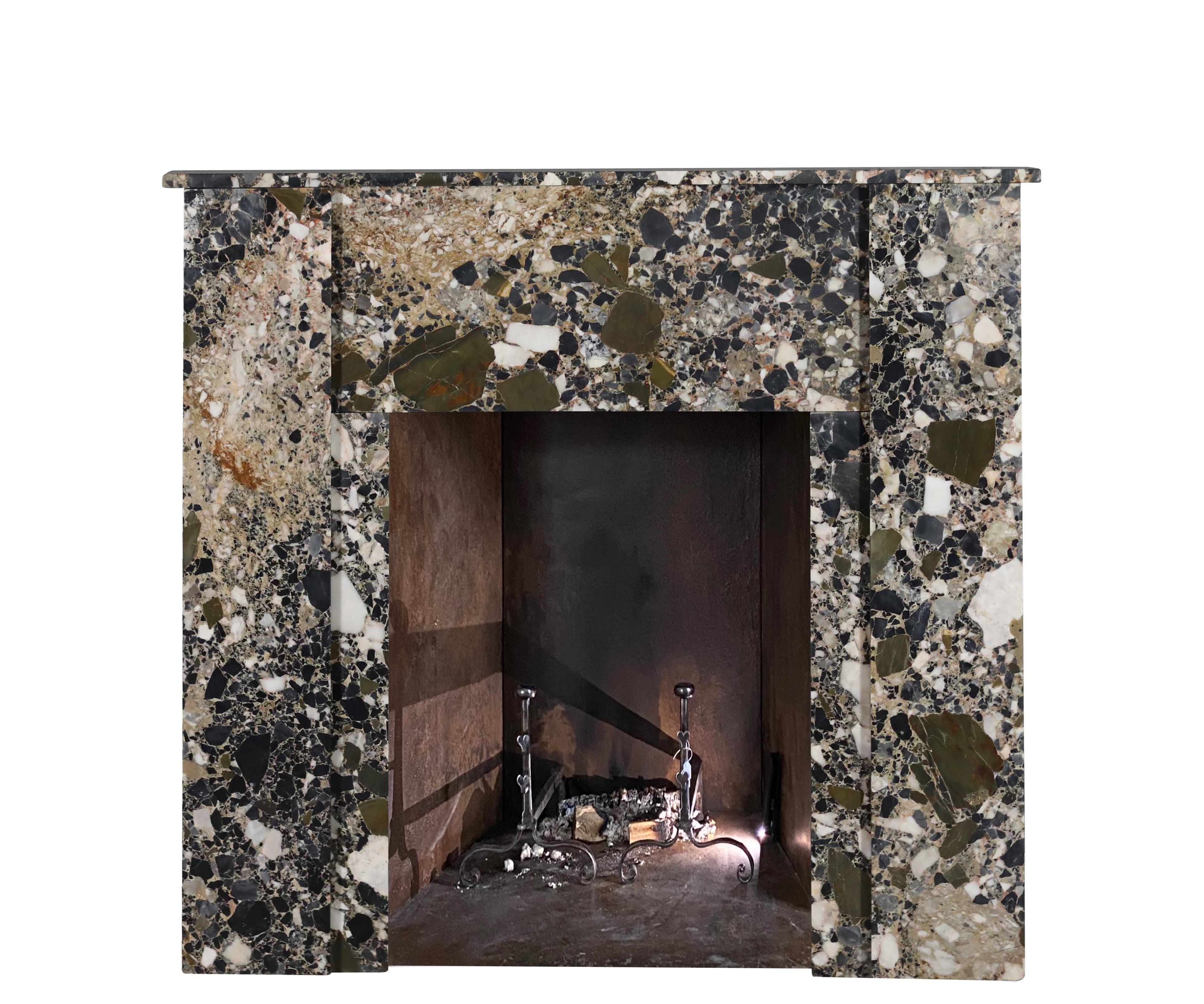 Exceptional Post-War vintage art-deco fireplace surround in a exquisite Breche Quality marble with terrazzo look.
Rich in color and pure minimalisme ready to install.
Measurements:
104,7 cm Exterior Width 41,22 Inch
96,5 cm Exterior Height 37,99