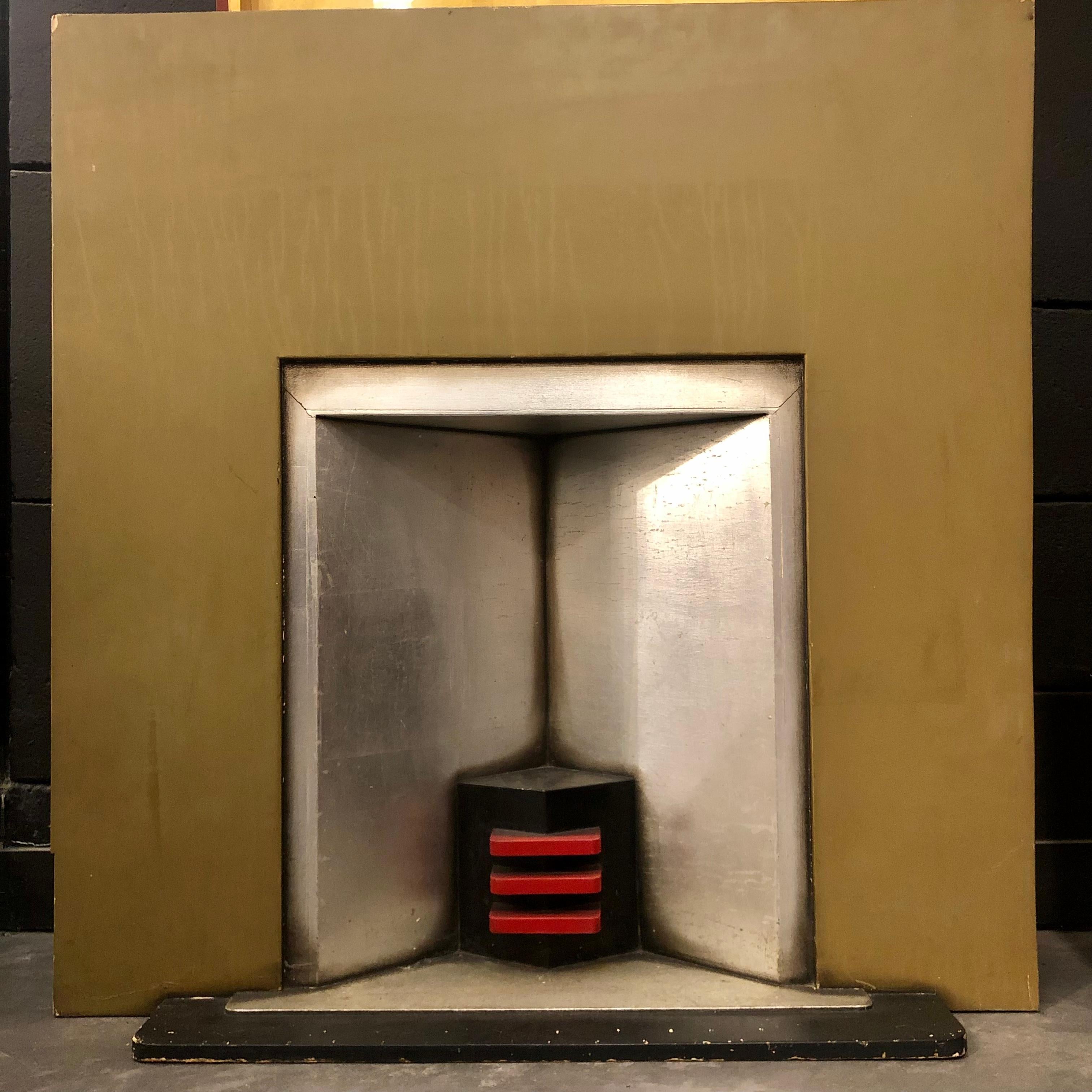 Art Deco mantel fireplace in lacquered wood attributed to huib hoste Flemish modernist architect .
The mantel is in lacquered silver wood.
Very uncommon and pure Art Deco style.