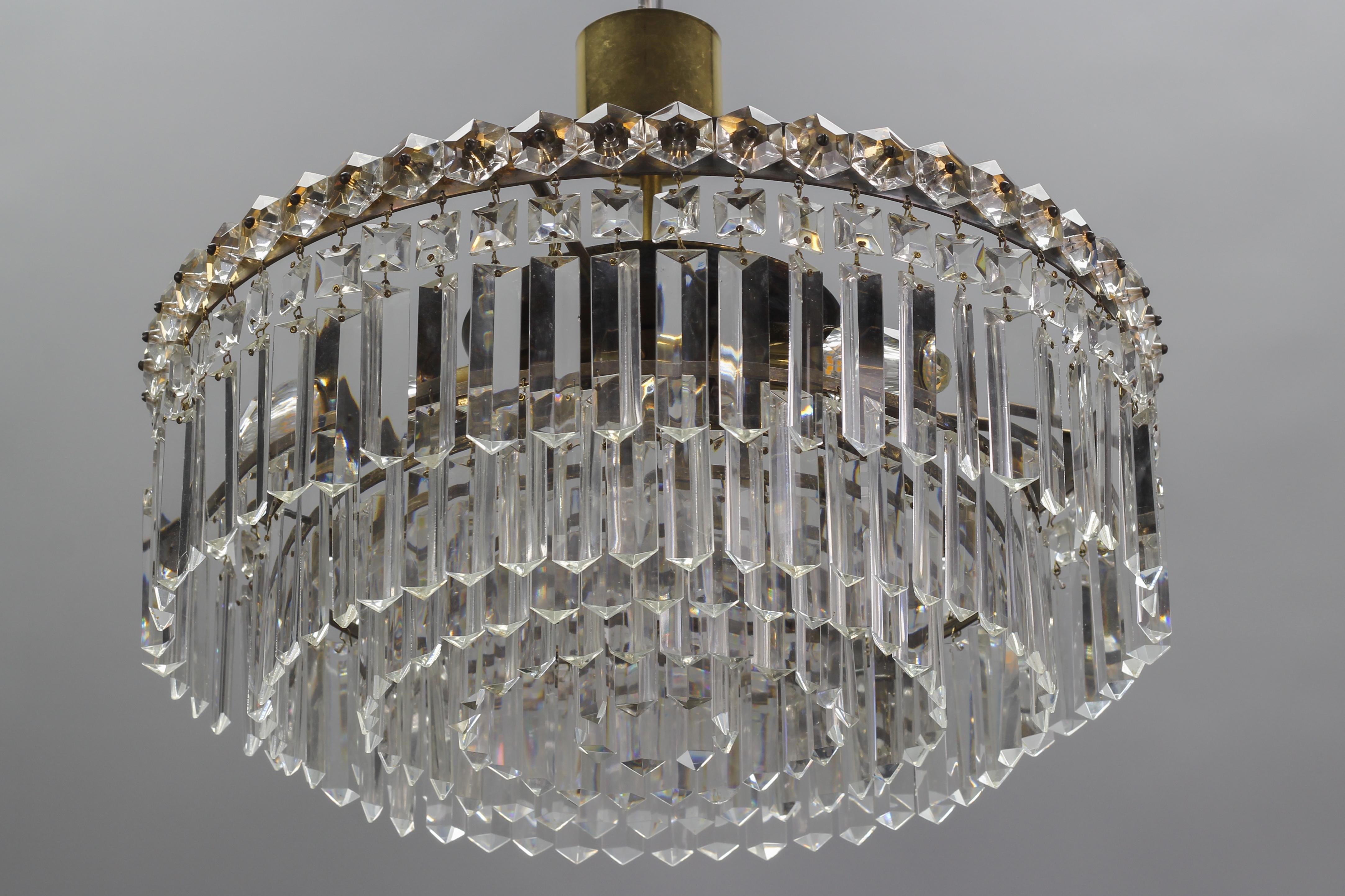 Art Deco Style Five-Tiered Three-Light Crystal Glass and Brass Chandelier In Good Condition For Sale In Barntrup, DE