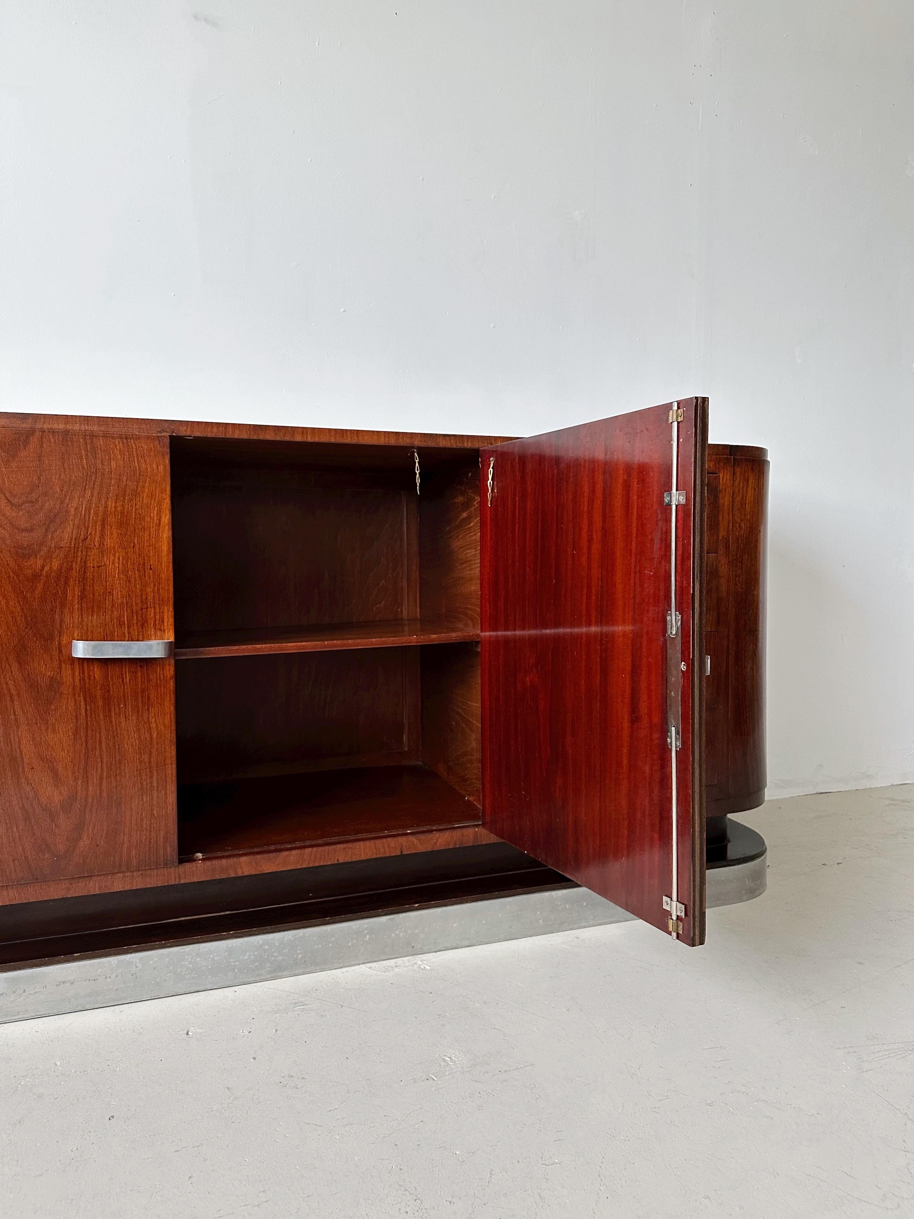 Mid-20th Century Art Deco Flame Mahogany Credenza with Aluminum Base & Accents For Sale