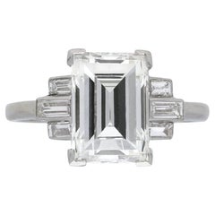 Vintage Art Deco Flanked Solitaire Step Cut Diamond Ring, circa 1925