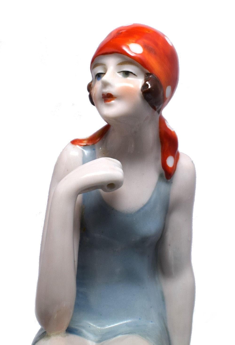 For your consideration is this very charming and totally authentic early 1930's Art Deco Flapper girl hat pin holder. Part of the half doll, pin cushion doll family this beautiful figure is an absolute delight and quite a rarity. Wonderful colouring