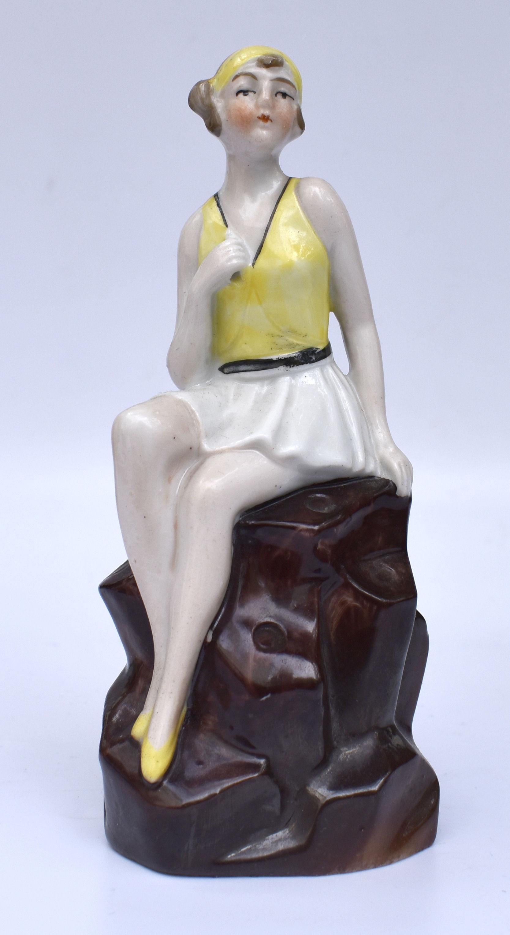 For your consideration is this delightful 1930's Art Deco Flapper girl hat pin holder. Dressed in the fashion of the day and part of the half doll, pin cushion family this beautiful figure is in great vintage condition. Beautiful colouring to her