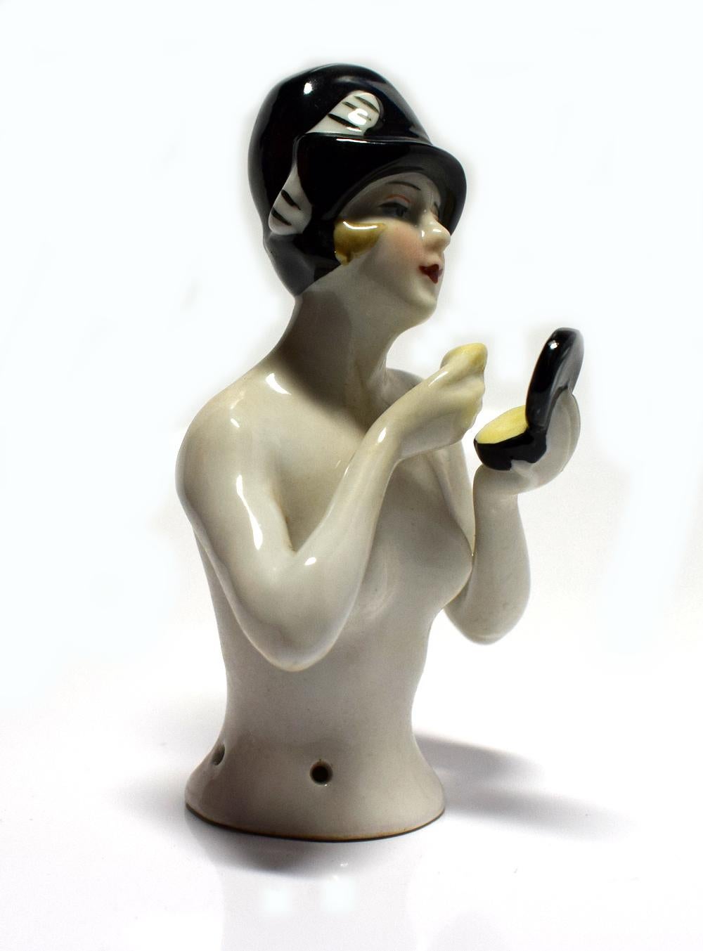 A beautiful half doll of great style and colors dating to the 1930s and a great addition to any collection. Dressed in a 