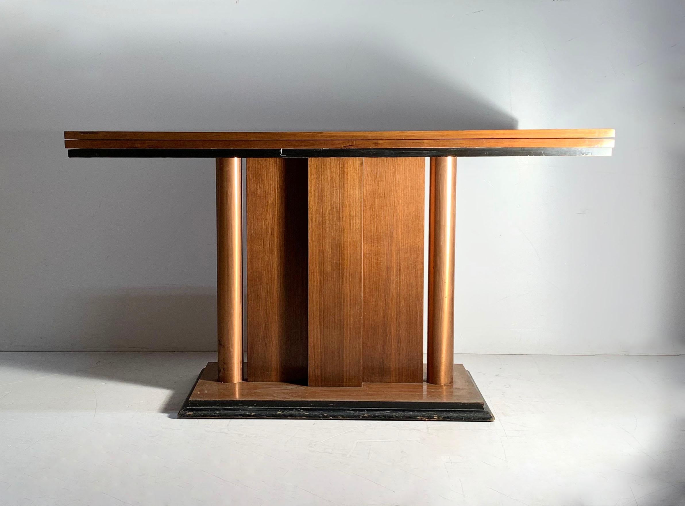 Art Deco flip top console dining table quite possibly by Donald Deskey for Valentine Seaver. 

some wear to the finish. Also I think the table should be taken to a Woodshop to stabilize. Weakened somewhat over the years. Possibly just screws need to