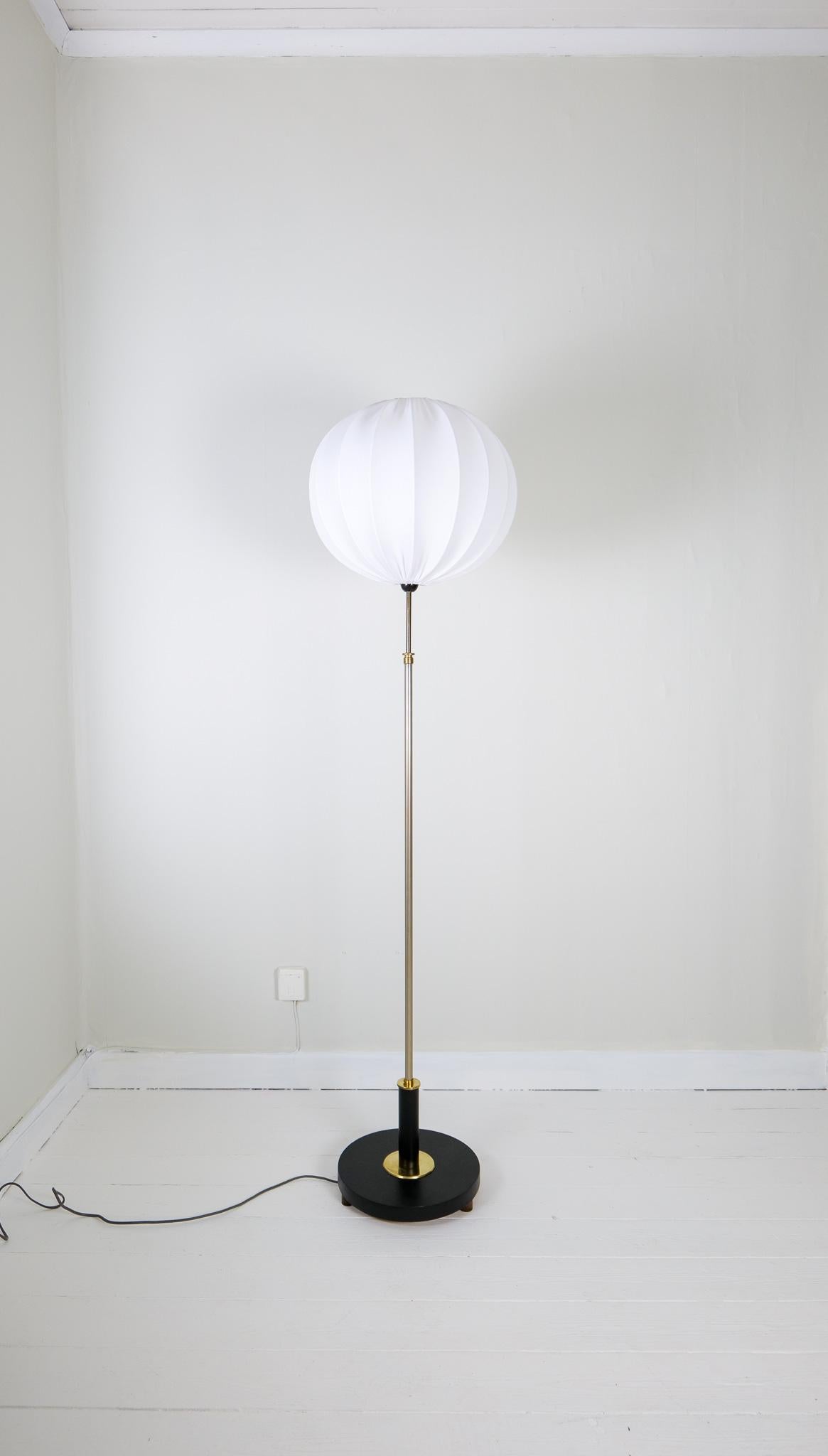 Swedish Art Deco Floor Lamp in Brass with Blackened Wood Sweden, 1940s For Sale