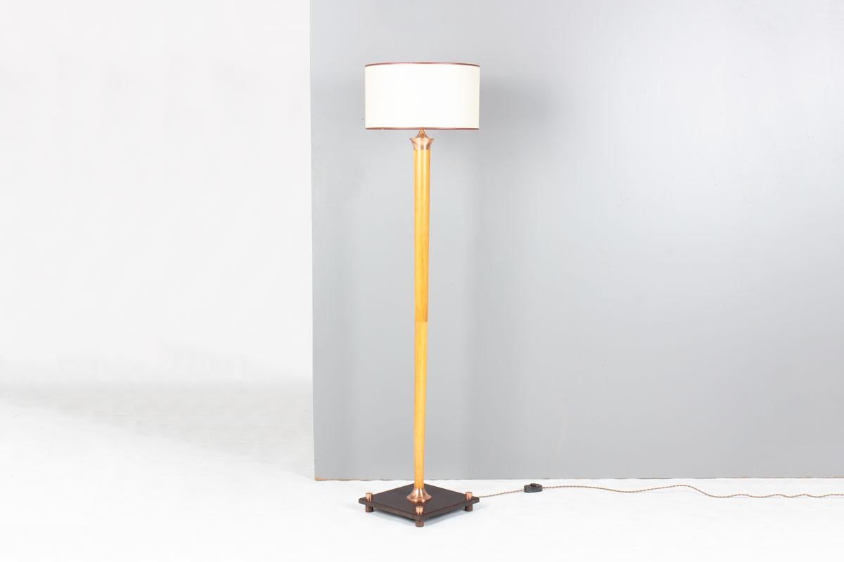Add a touch of Art Deco refinement to your interior with this elegant floor lamp crafted from pearwood, copper, and bakelite, and topped with a custom-made paper lampshade.

Dating from the 1930s, this piece perfectly captures the spirit of the Art