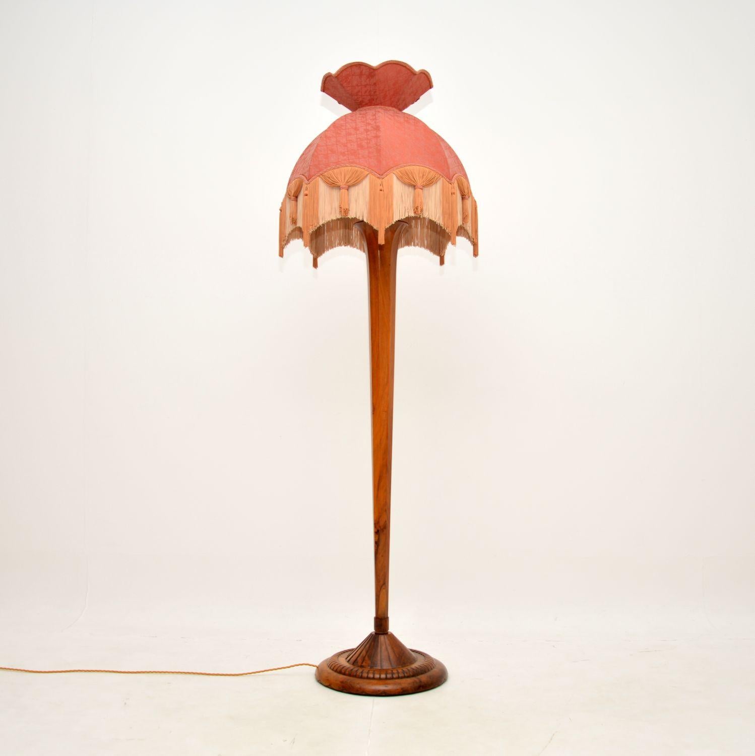 An absolutely stunning and very impressive Art Deco floor lamp in solid walnut. This was made in England, it dates from around the 1920-30’s.

It is of exceptional quality, with a very bold and beautiful design. The stand has a lovely tapered shape