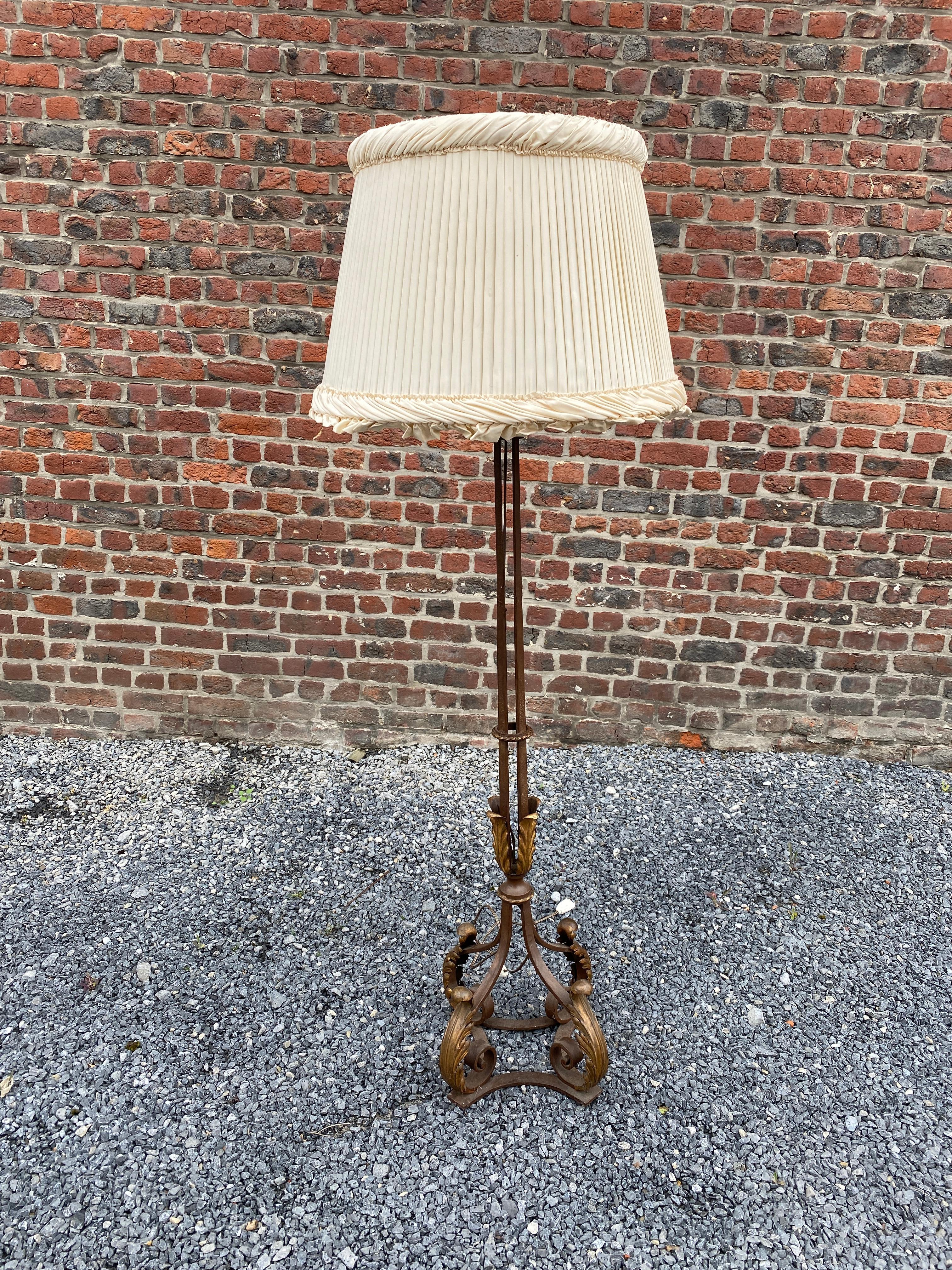 Art Deco floor lamp in the style of Gilbert Poillerat, circa 1940.
The lamp shade is in poor condition.