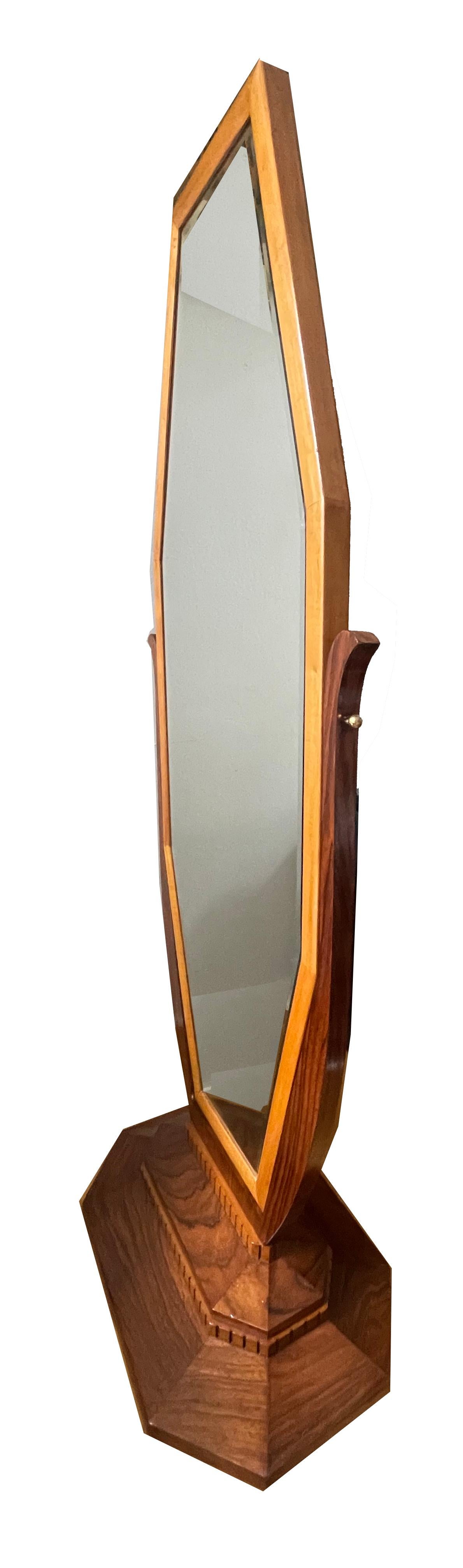 The Art Deco floor-standing mirror with a movable mirror, crafted in France around 1930, is an outstanding example of the elegant and innovative design of the Art Deco era. This floor-standing mirror combines noble materials with refined design and