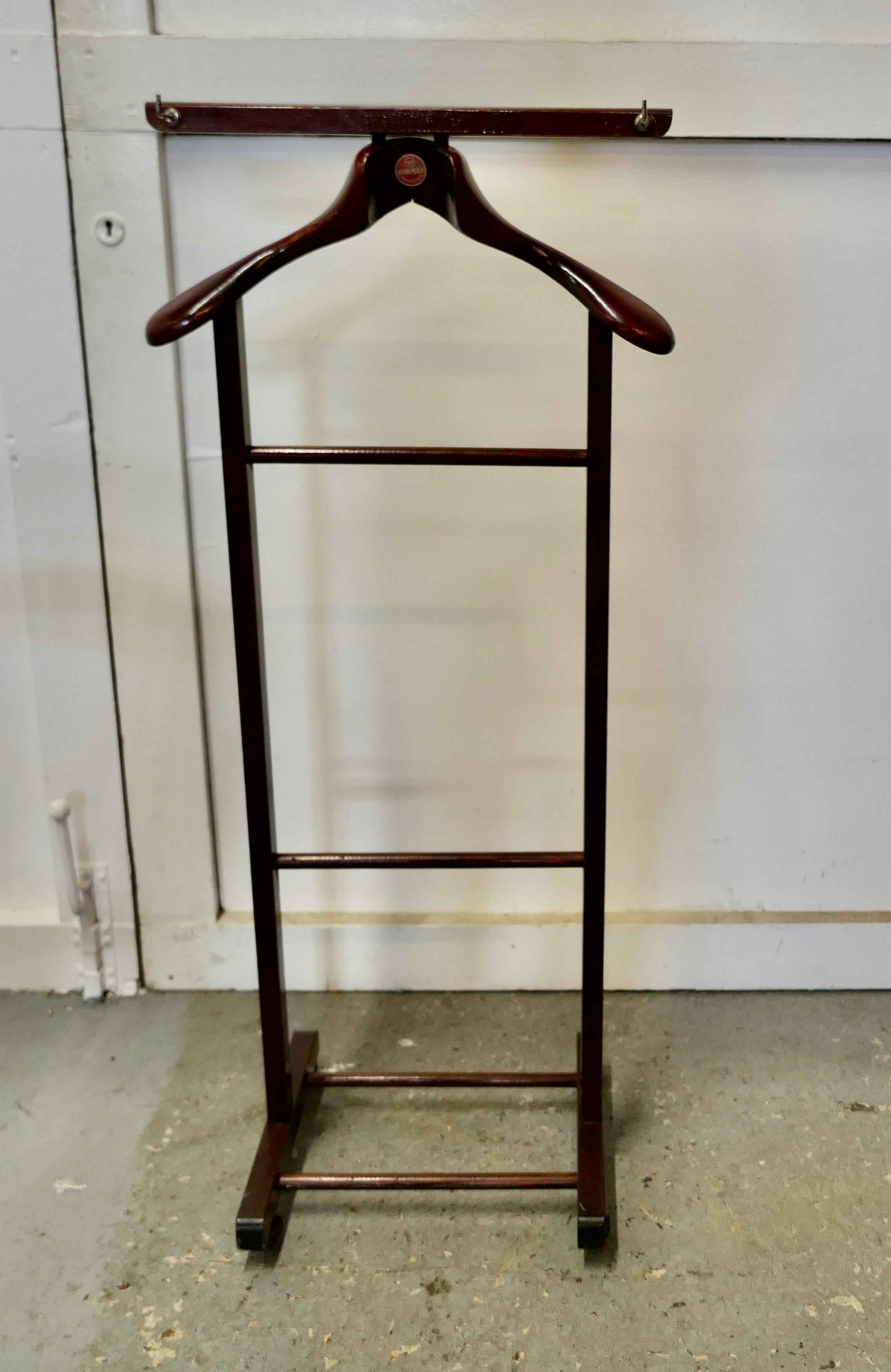 Art Deco floor standing suit hanger, Formax Valet by Brevete

 A very useful piece, the hanger or Valet is made in Beech, it will accommodate jacket and trousers, but it would do just as well for your jeans and a jacket overnight or would make an