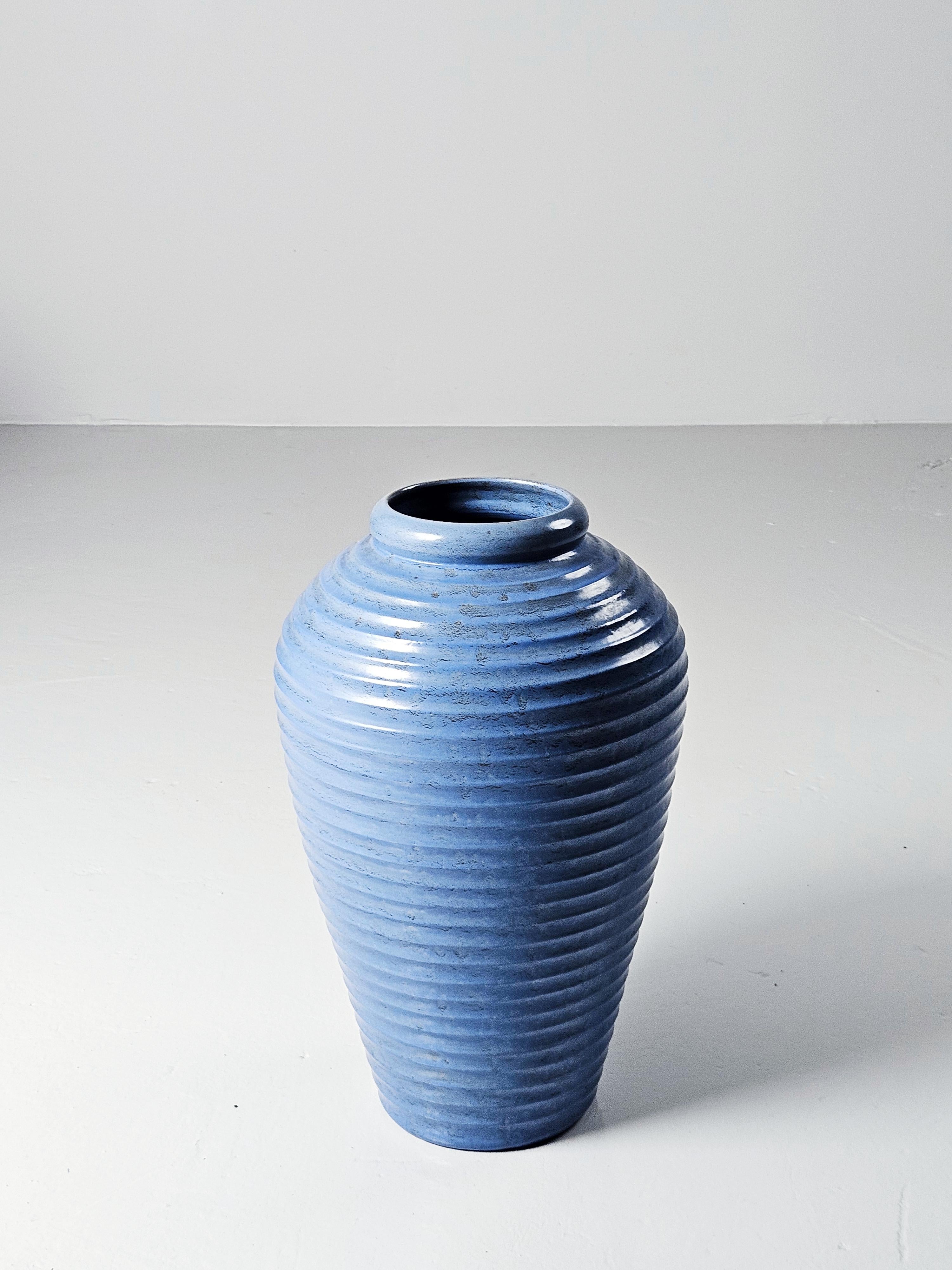 Floor vase designed by Jerk Werkmäster and produced by Nittsjö in the middle of the 20th century. 

Werkmäster was the artistic director at Nittsjö Ceramics between 1933-1967.